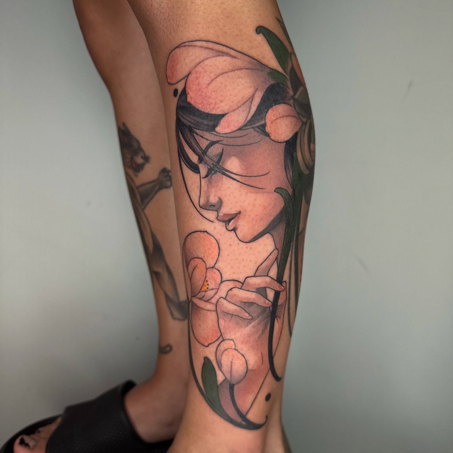 Flower and woman dotwork tattoo on the forearm by Angel, Salt Lake City, Utah