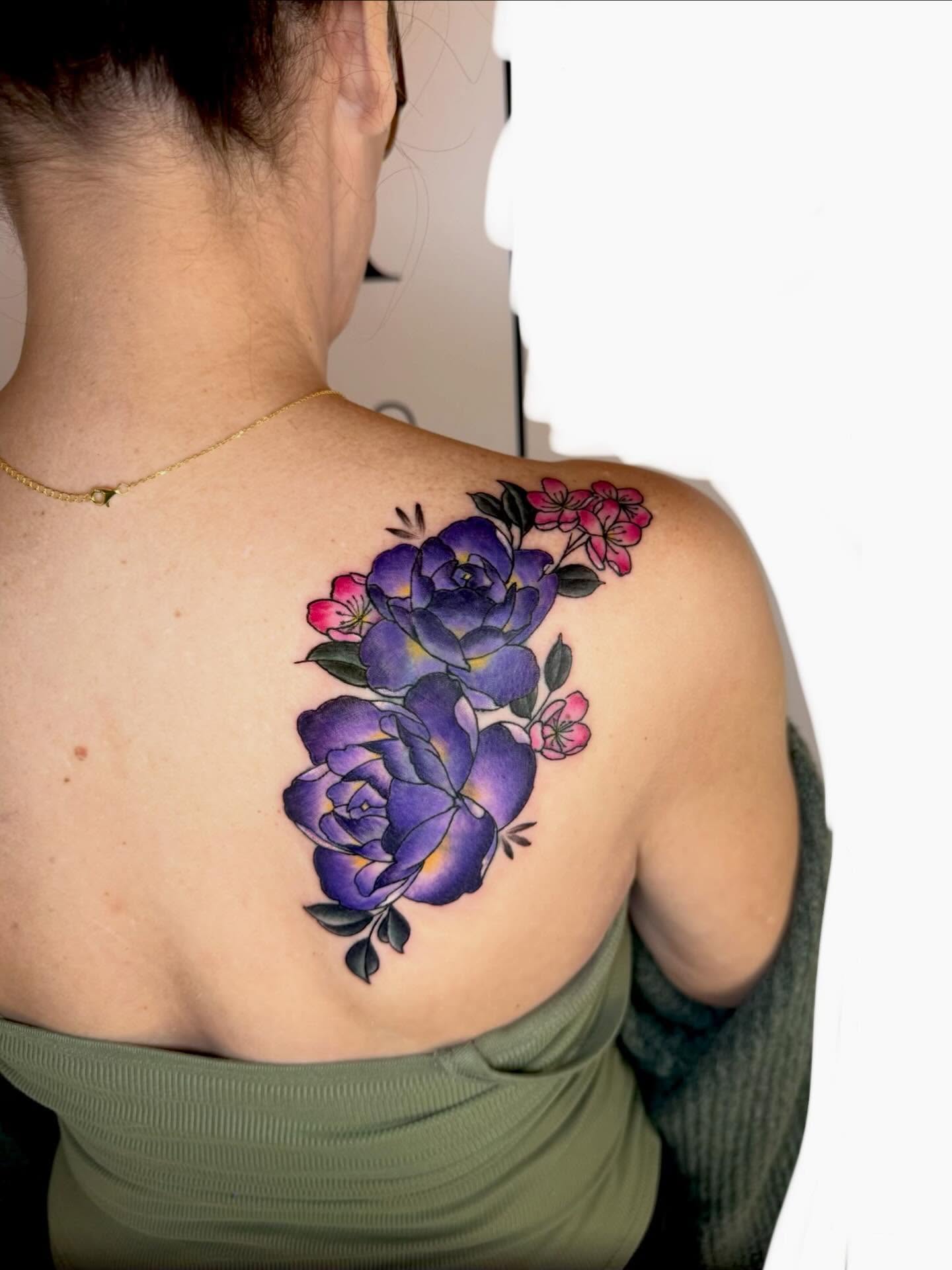 Purple roses American traditional tattoo on the shoulder by Paul Calhoun Tattoos, Englewood, Ohio