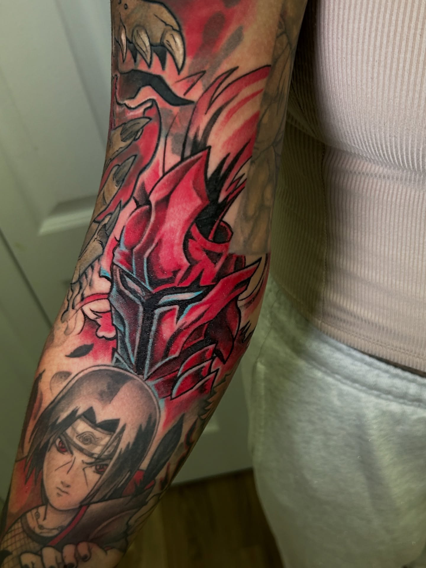 Anime character anime tattoo on the forearm by Mando Castro