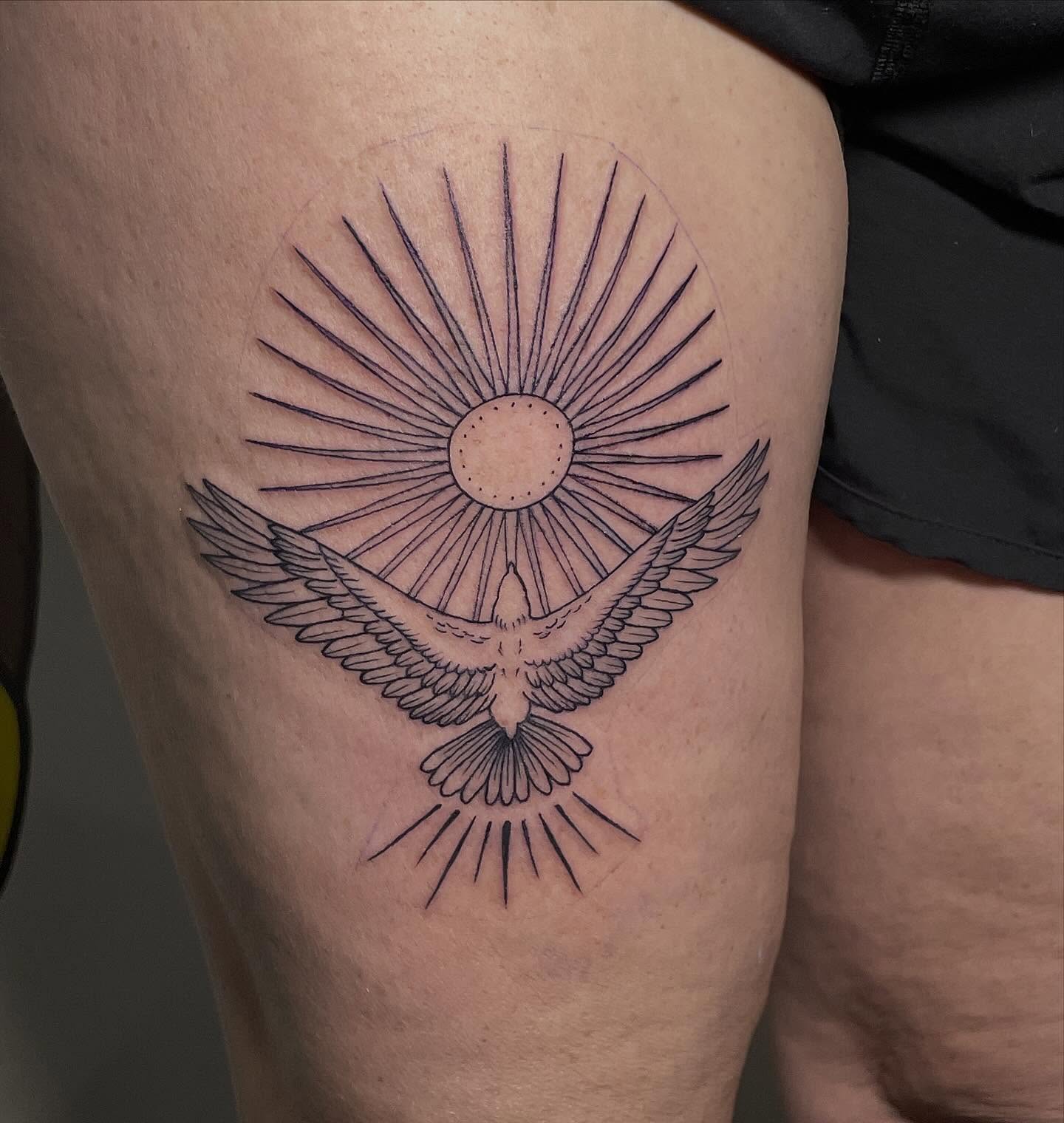 Sun and dove black and grey tattoo on the thigh by Sophia, New Carlisle, Ohio