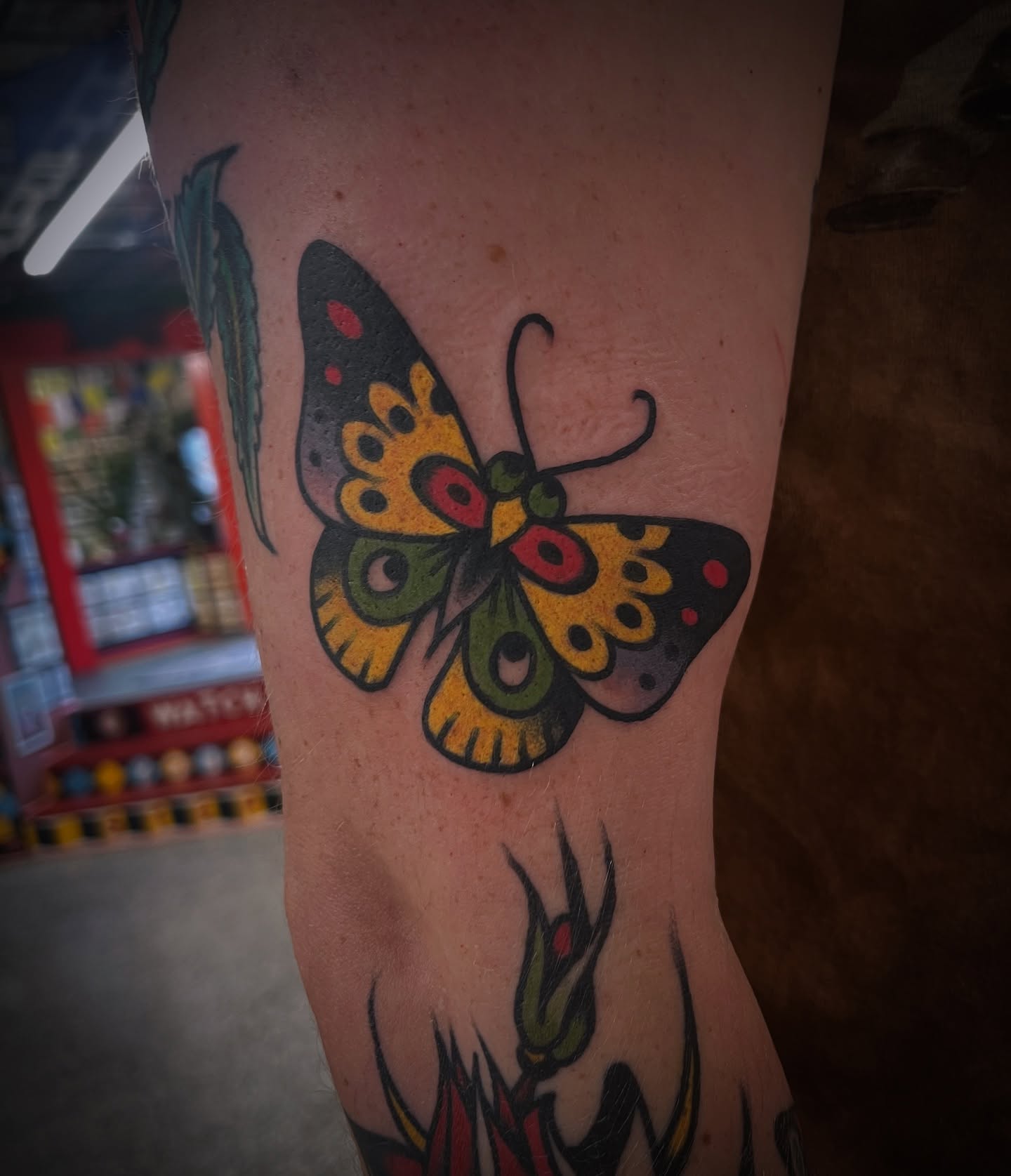 Butterfly American traditional tattoo on the forearm by Deya Aven, Nashville, Tennessee