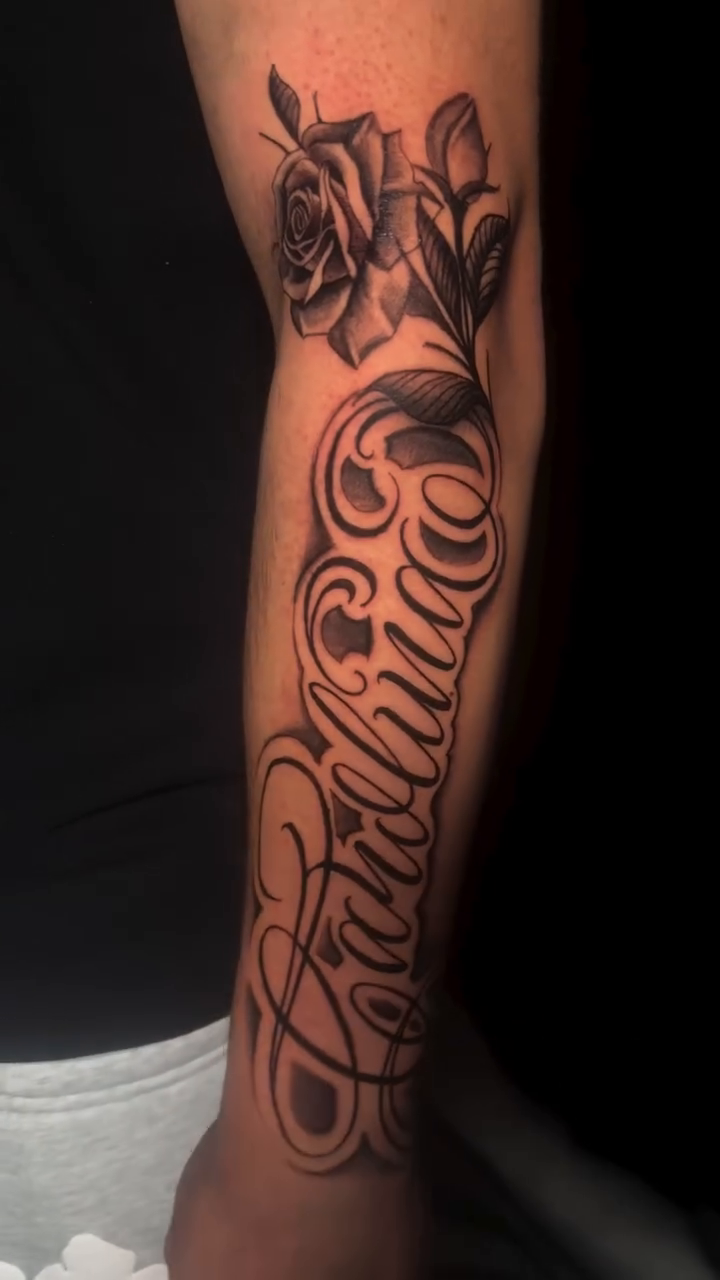 Laaralann script with roses lettering script tattoo by J.diaz🎖️