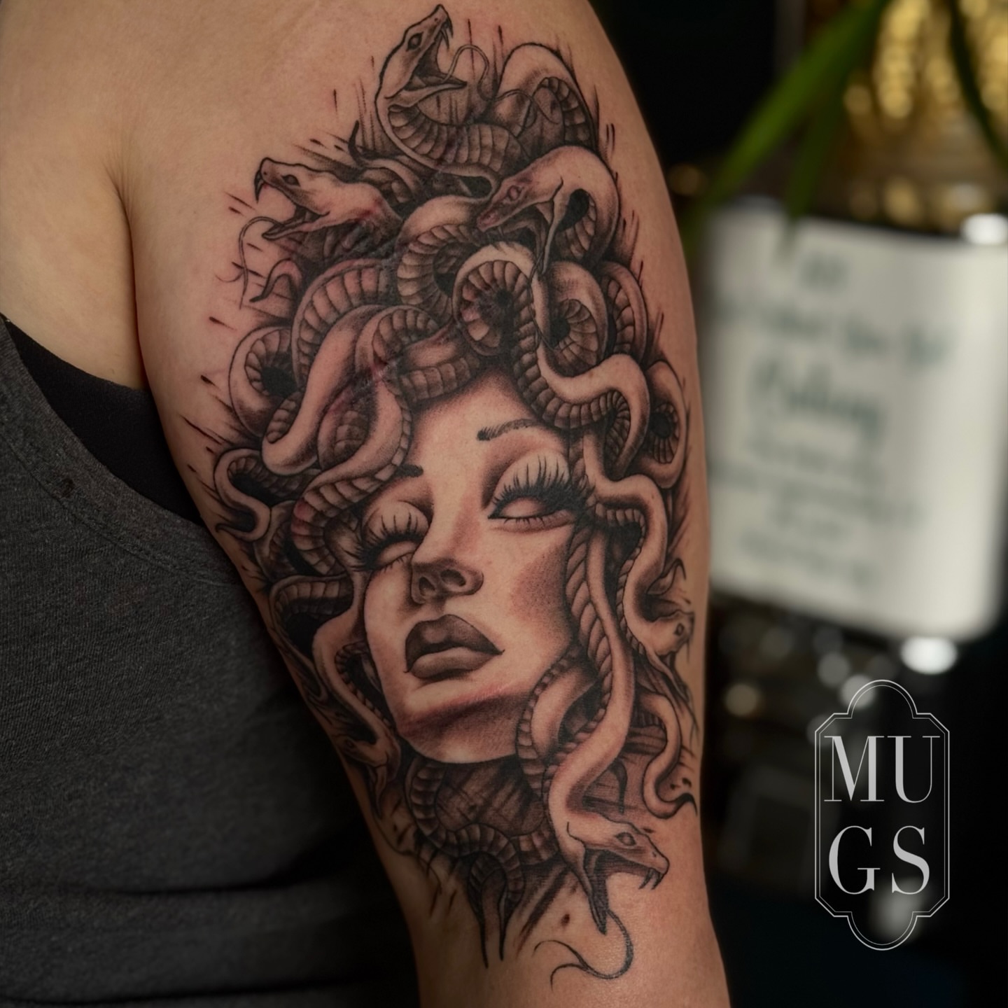 Medusa realism tattoo on the shoulder by Emily Andreozzi