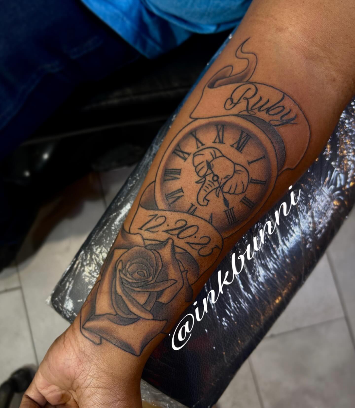 Clock and rose realism tattoo on the forearm by Hailey Aka inkbunni, Detroit, Michigan