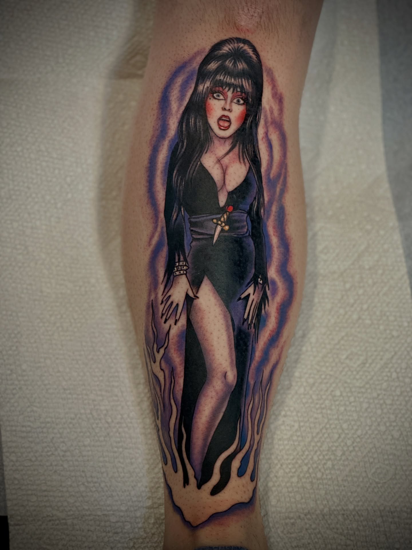 Elvira dark realism tattoo on the forearm by Holly Ellis, San Francisco, California