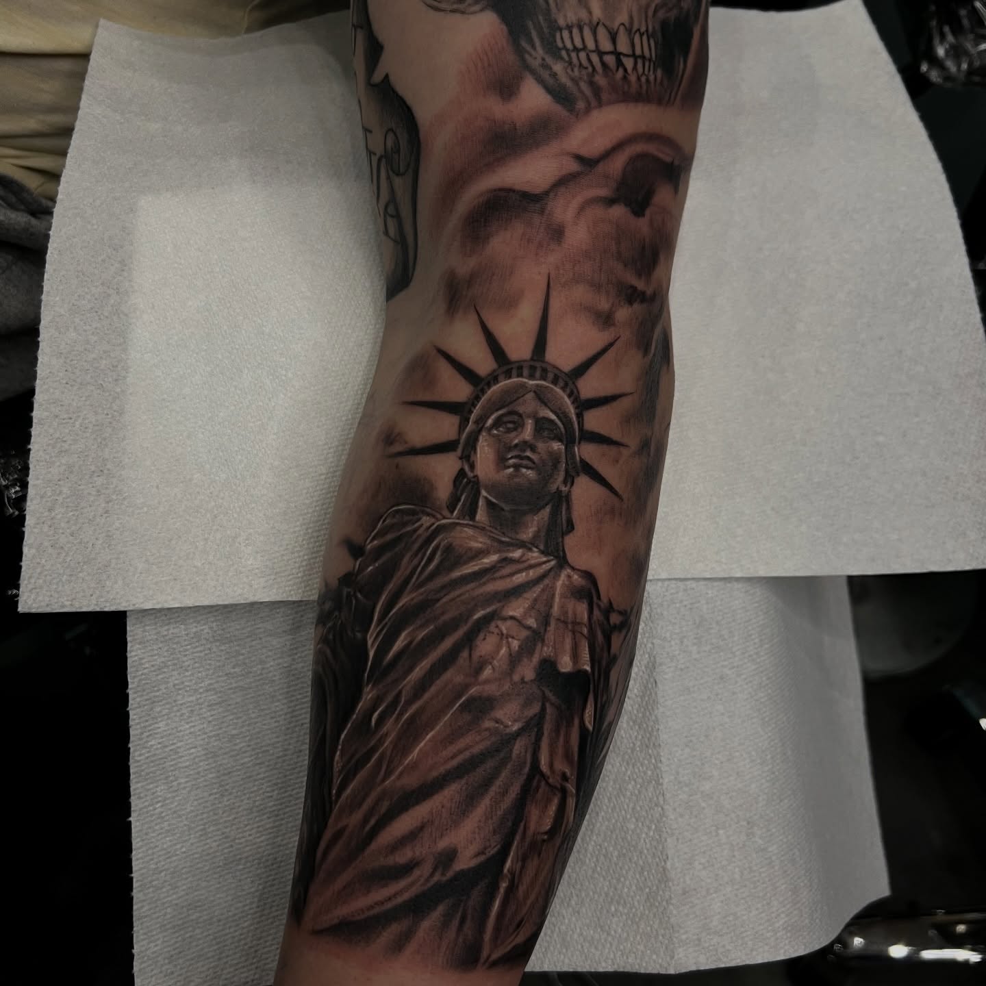 Statue of liberty realism tattoo on the forearm by Tony Hernandez, Chicago, Illinois