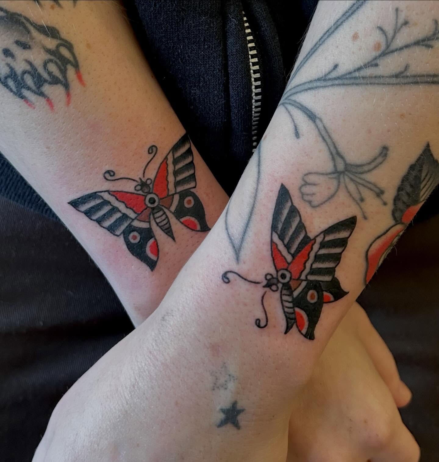 Butterfly American traditional tattoo on the forearm by Christian Lasyone