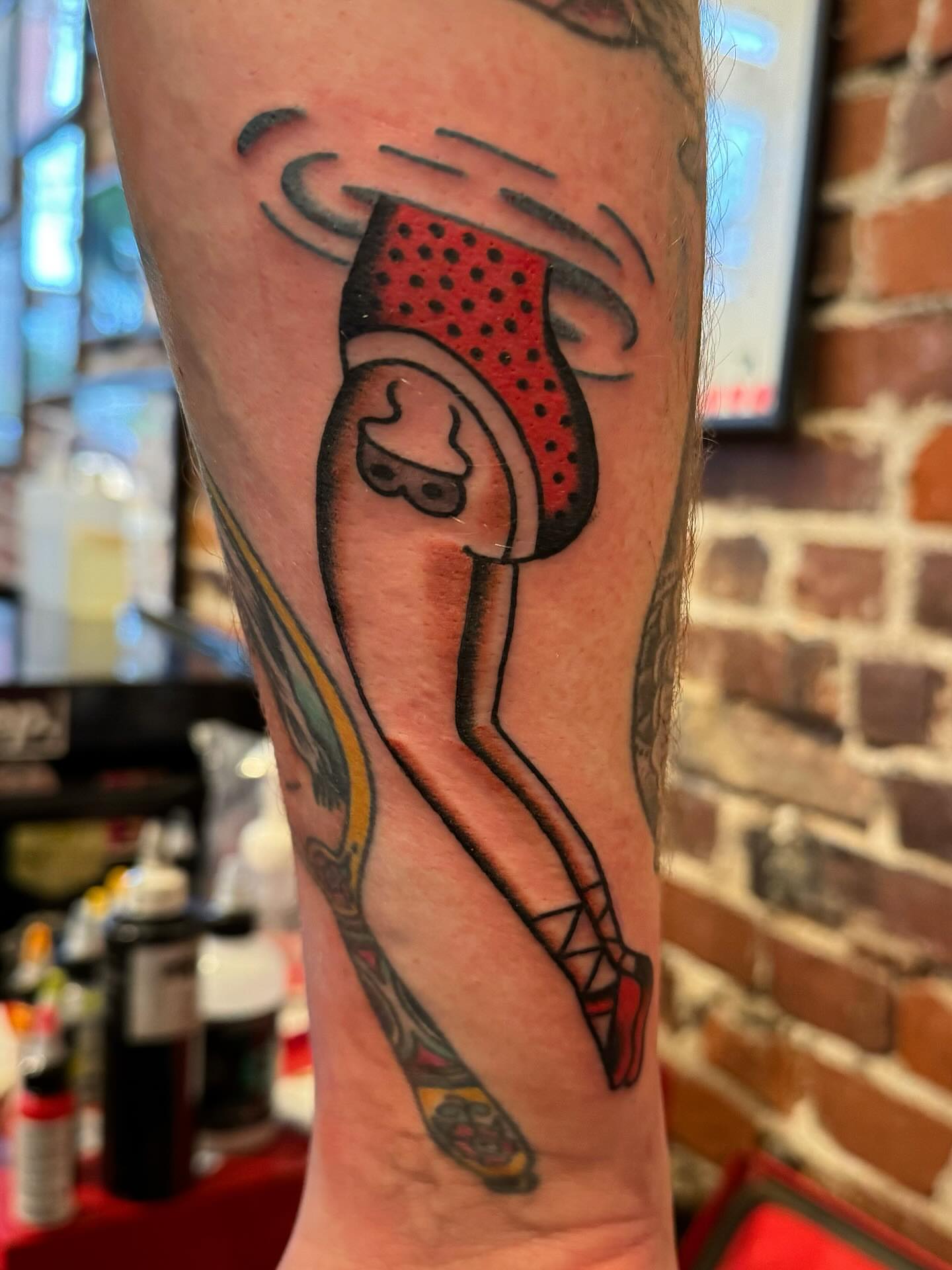 Dancer American traditional tattoo on the forearm by Bryce Shearer