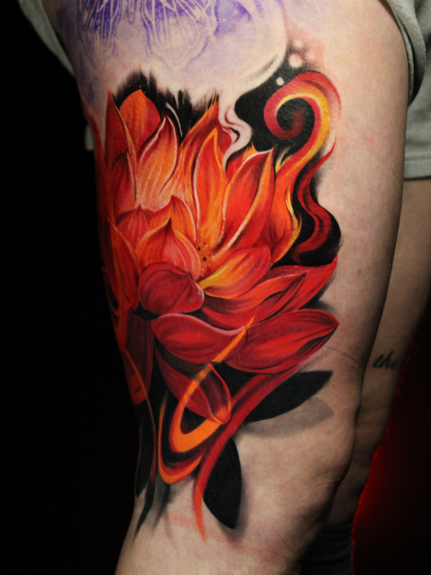 Flame new school tattoo on the forearm by Eva Williams