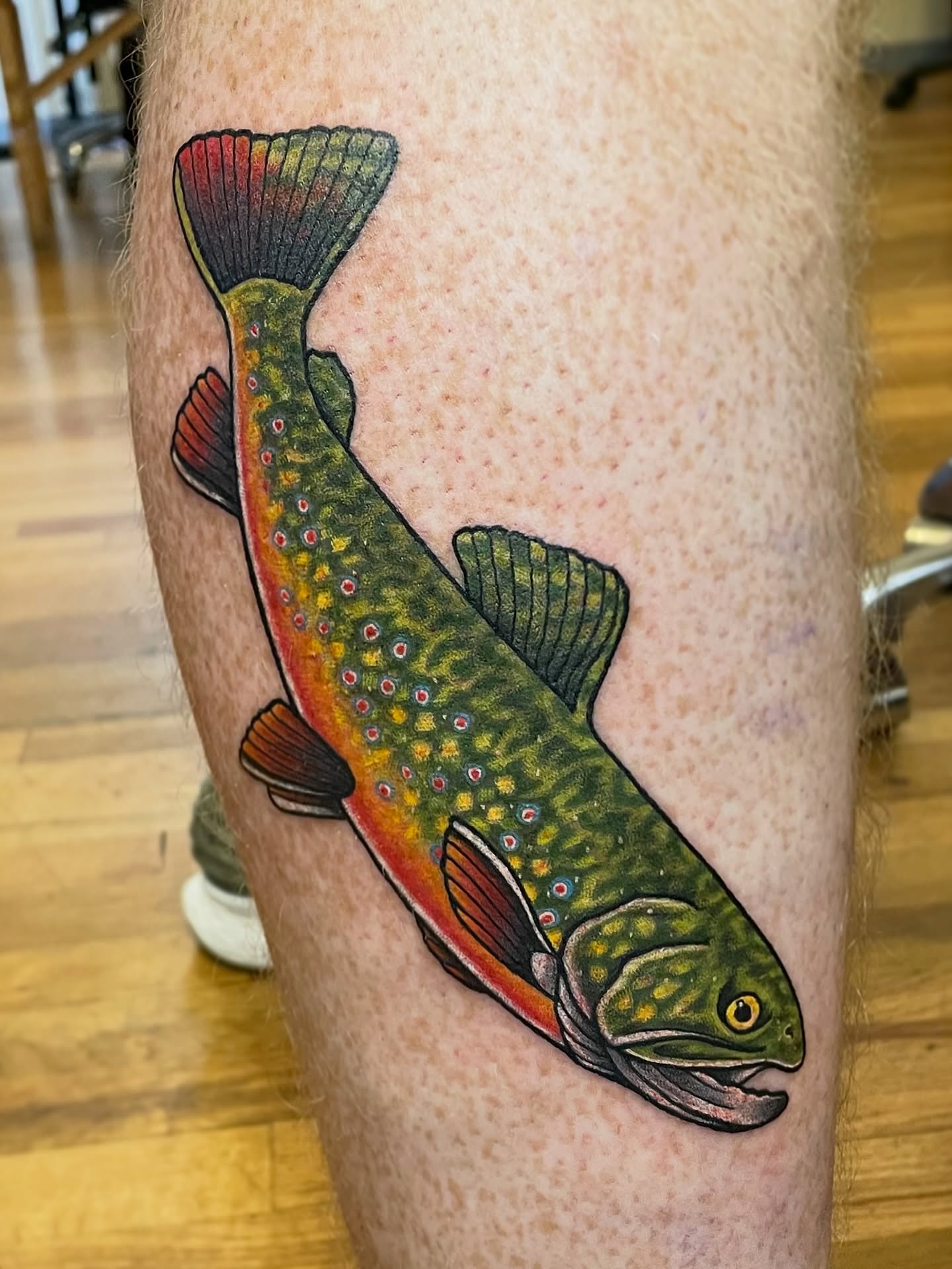 Brook trout American traditional tattoo on the leg by πΌπ
ππΎπππππ