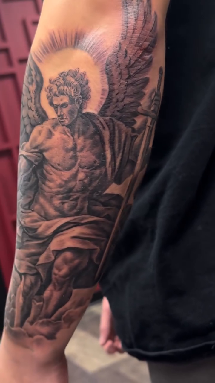 Angel with sword realism tattoo by Matthew Doherty