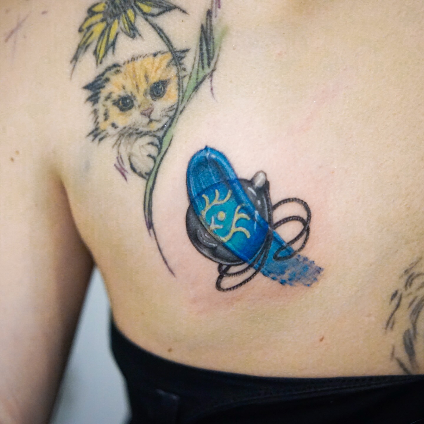 Cat and butterfly realism tattoo on the chest by Gemma✨ Realismtattoo