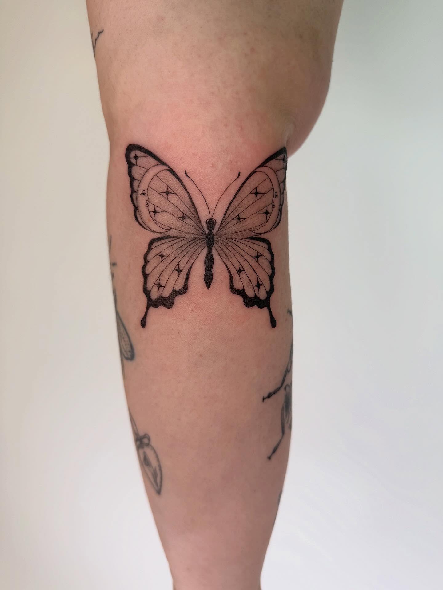 Butterfly black and grey tattoo on the forearm by Leah Ramos