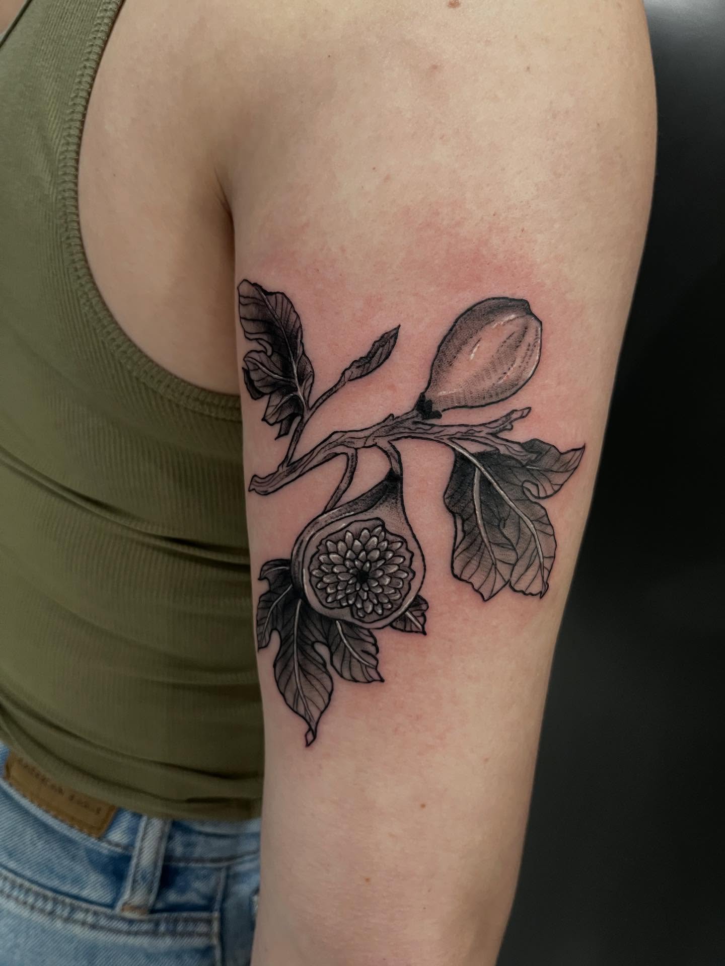 Peach blossom black and grey tattoo on the forearm by Lexi Odam