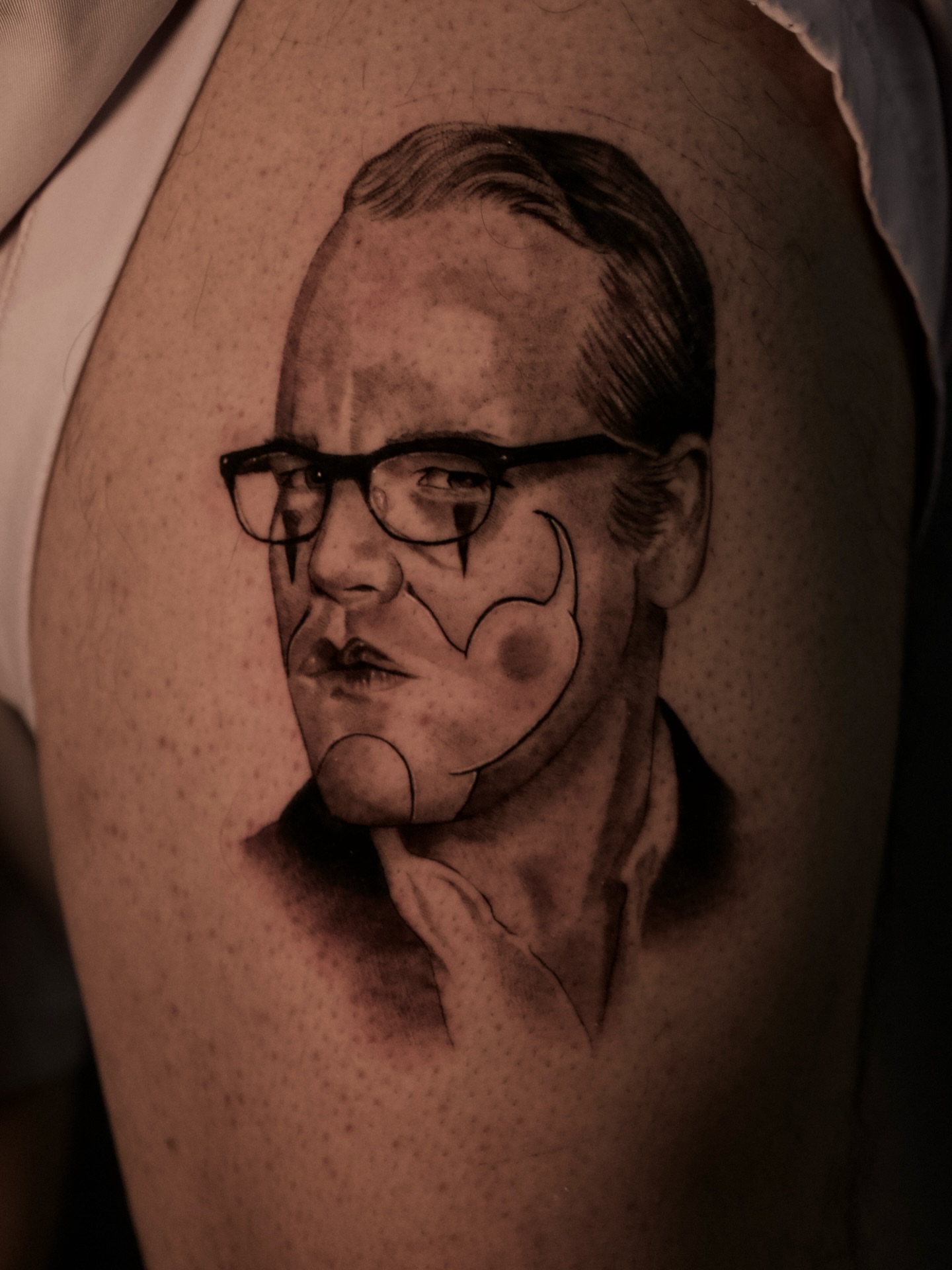 Portrait realism tattoo on the upper arm by R O M y R I N C Ó N