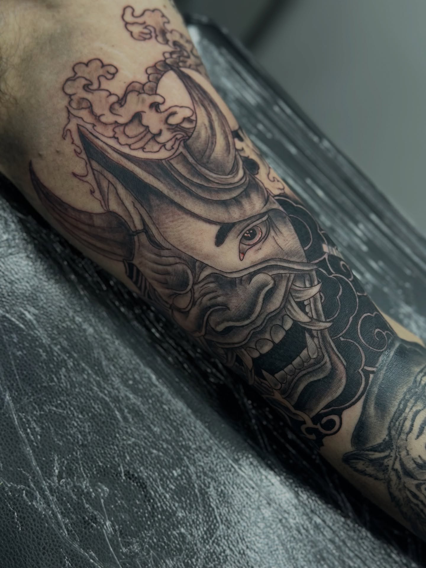 Horse head black and grey tattoo on the forearm by Sk Pierce