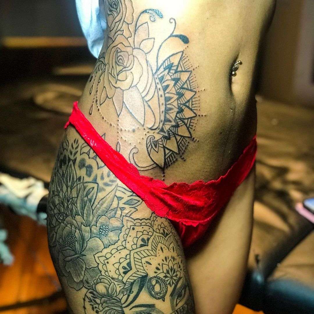 Floral mandala dotwork tattoo on the thigh by Emac, Baltimore, Maryland