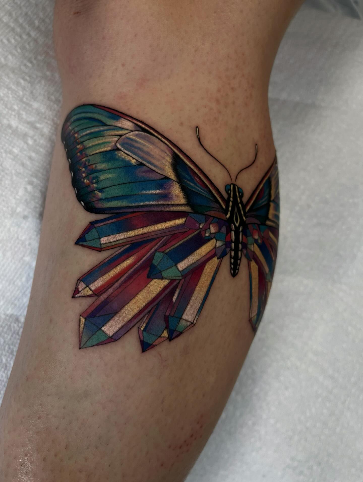 Geometric butterfly geometric tattoo on the forearm by Sacramento Tattoos (Ilona)