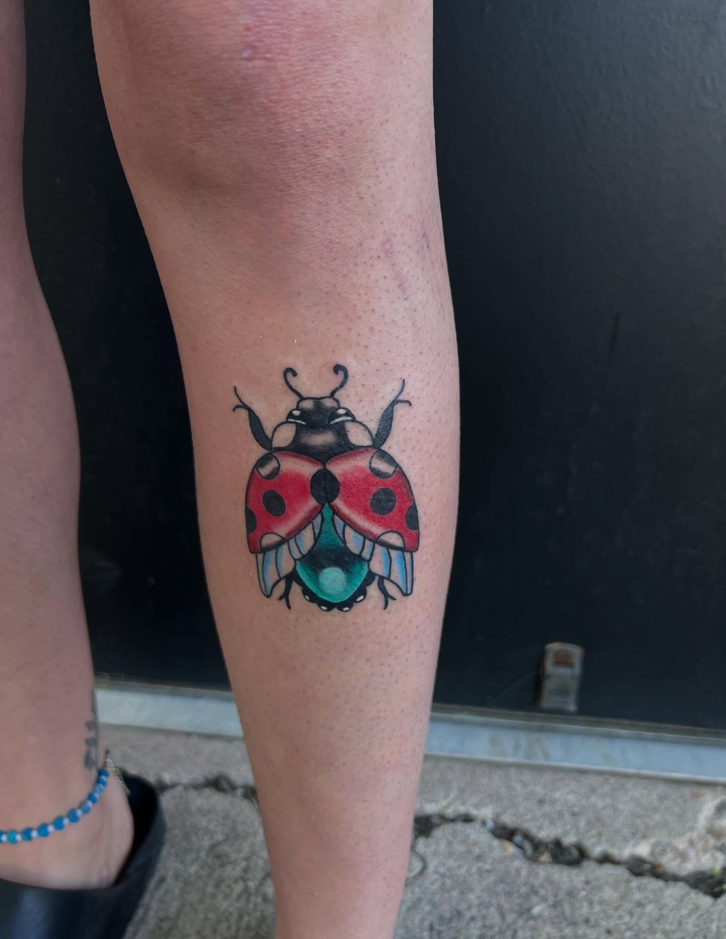 Ladybug trash polka tattoo on the leg by Ellari