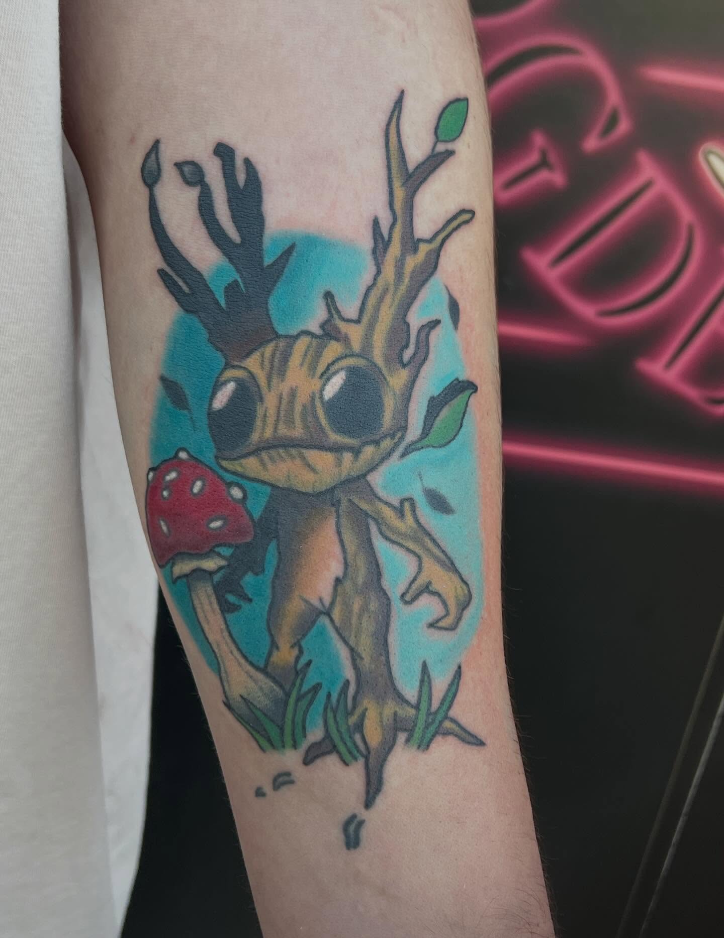 Groot illustrative tattoo on the forearm by Ellari