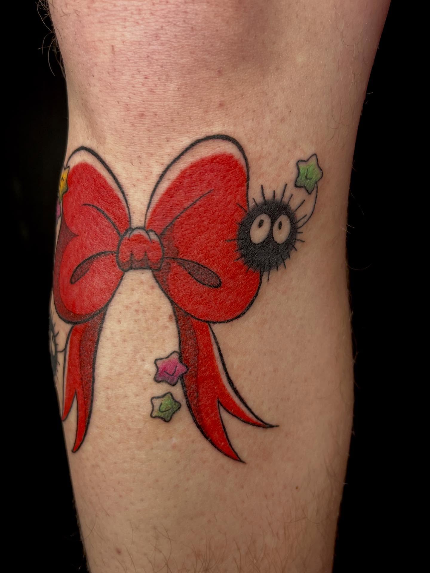 Red bow American traditional tattoo on the forearm by Chase Healey, Salt Lake City, Utah