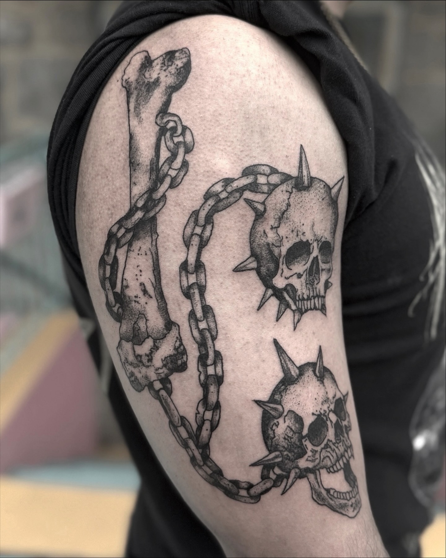 Skulls and chains realism tattoo on the shoulder by Tattoo Artist, Philadelphia, Pennsylvania