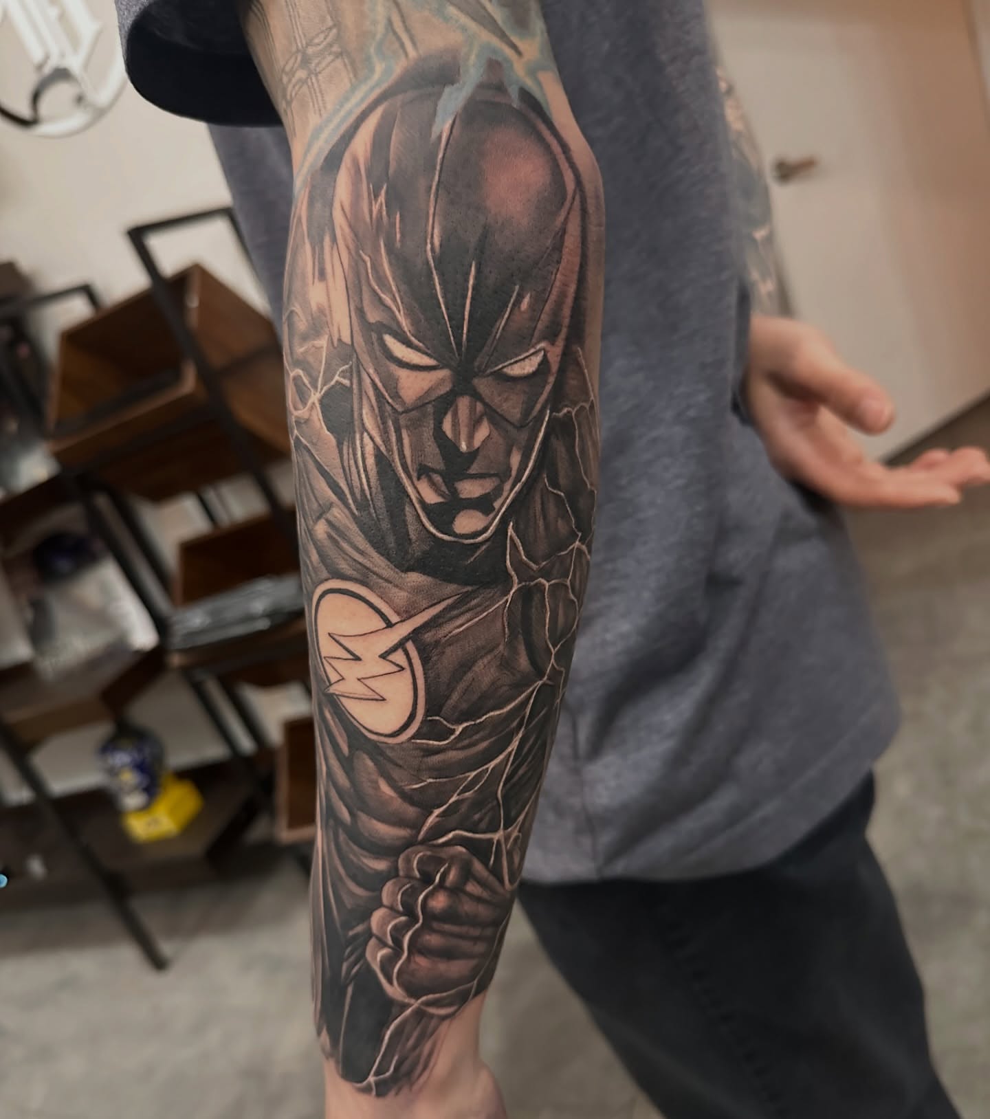 The flash realism tattoo on the forearm by Travis