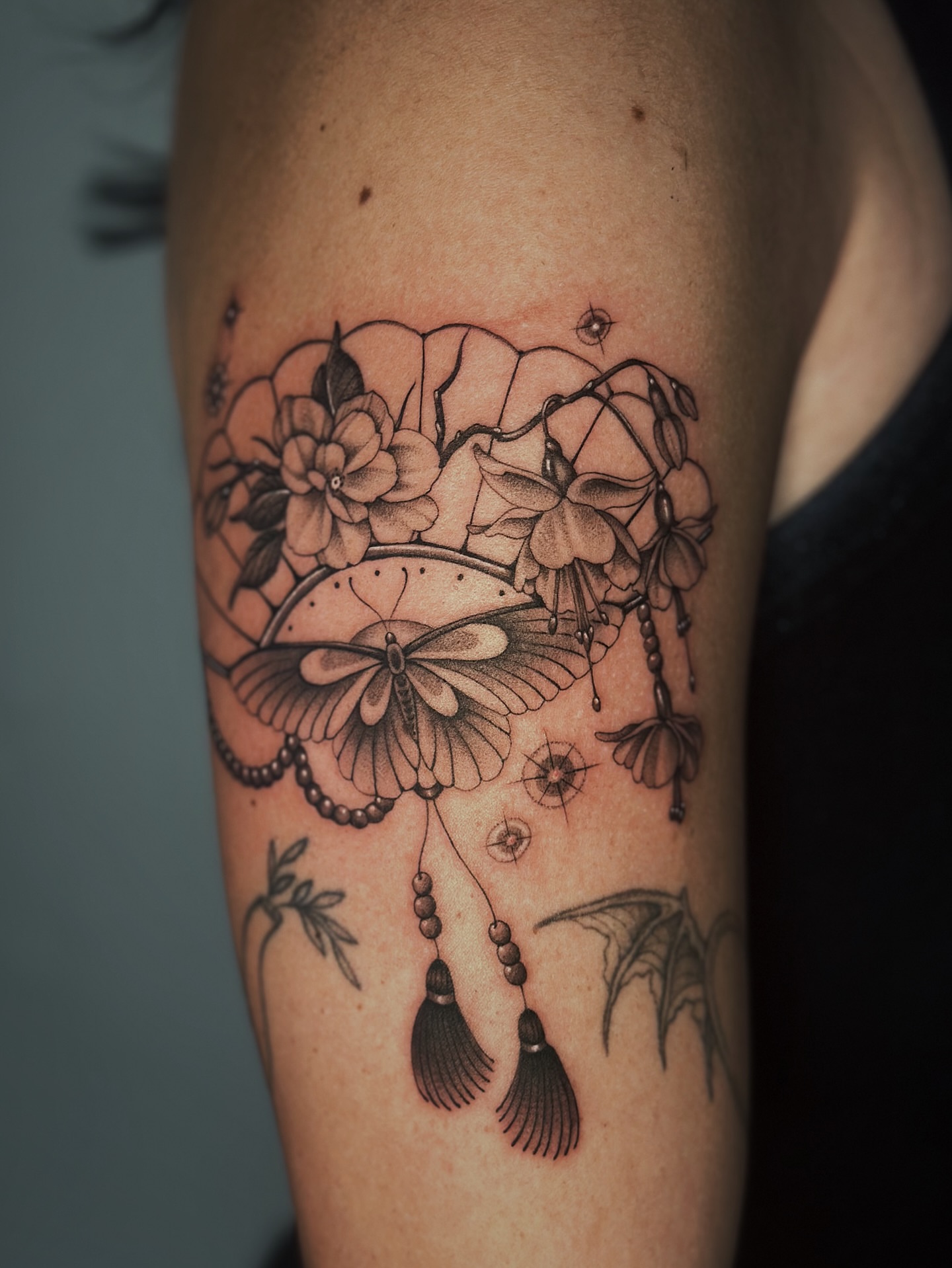 Butterfly and flowers ornamental tattoo on the forearm by Lauryn Jenesis