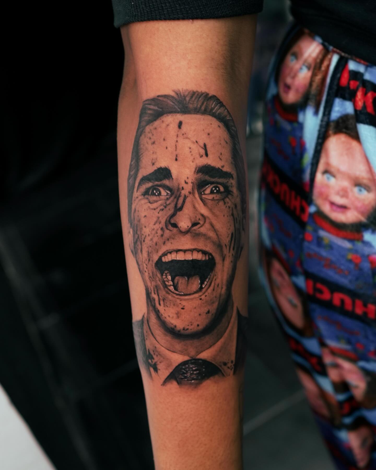 Man's face realism tattoo on the forearm by Rachel