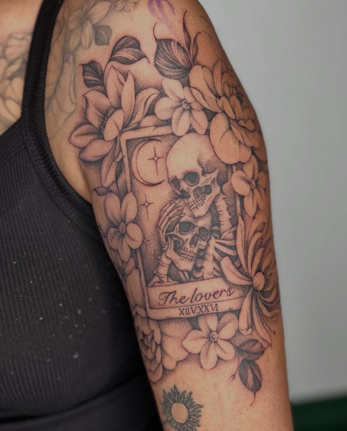The lovers tarot card realism tattoo on the upper arm by Ash F