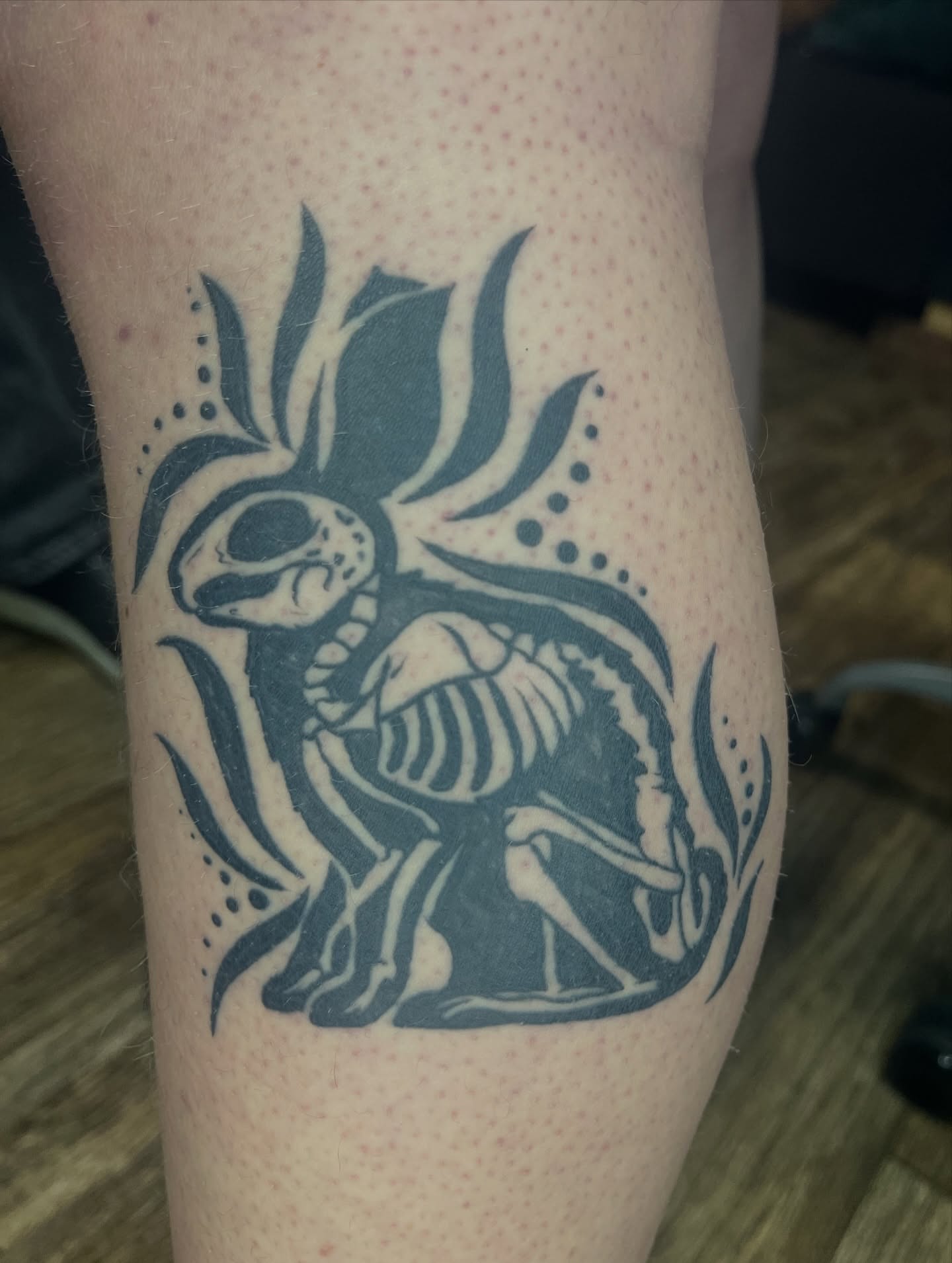 Skeleton with lotus dotwork tattoo on the forearm by Anya💋~NC Tattoo Artist