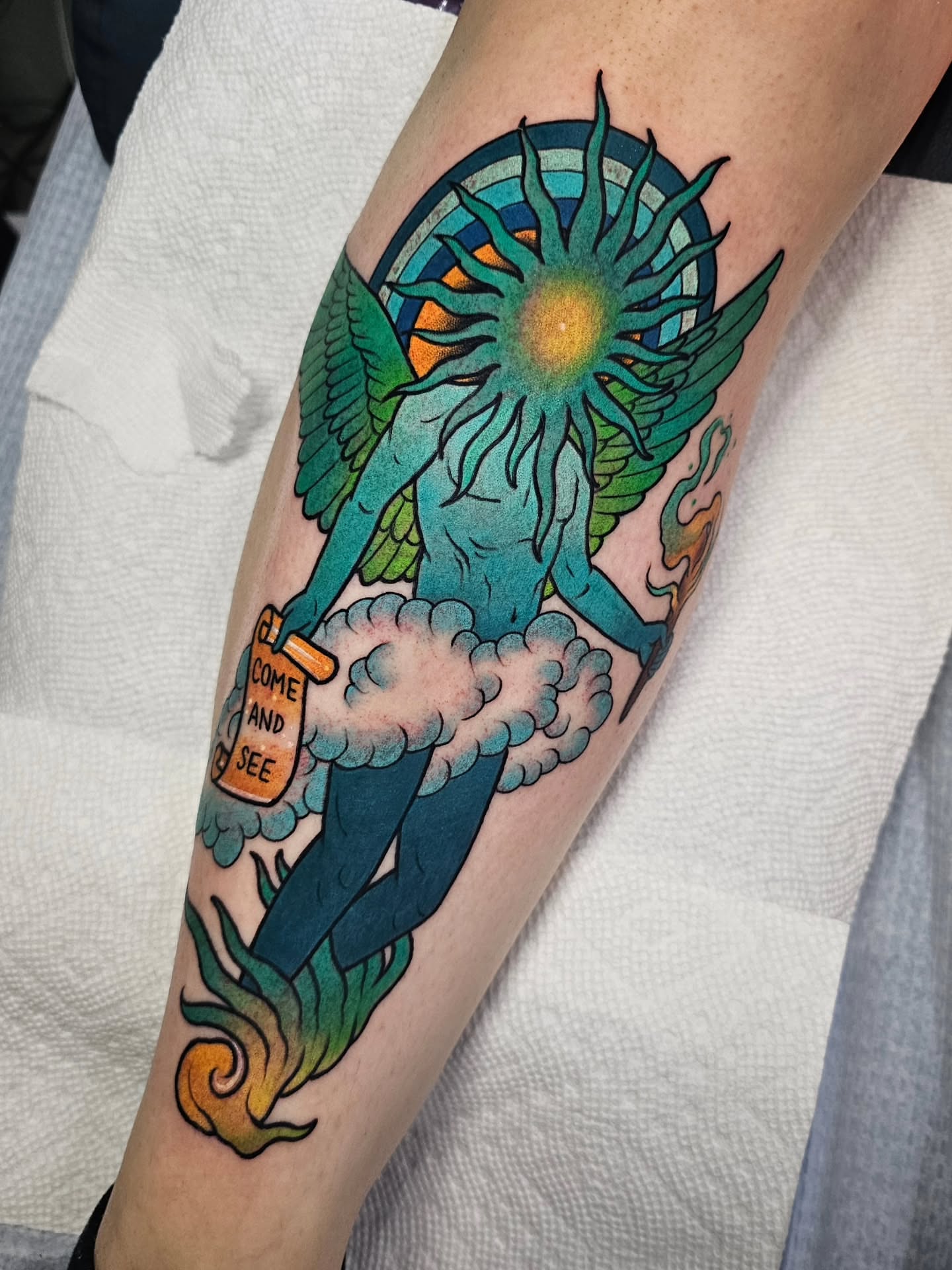 Mermaid with sun American traditional tattoo on the forearm by Shannon