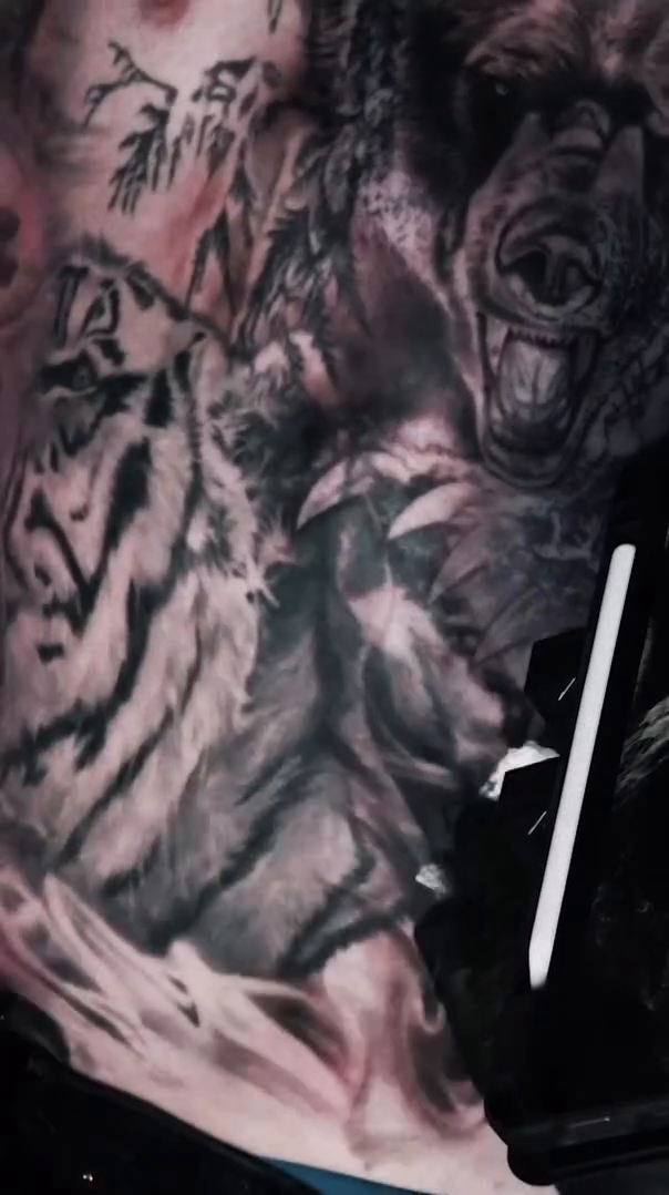 Bear and tiger realism tattoo by Lynn Hoang, Honolulu, Hawaii