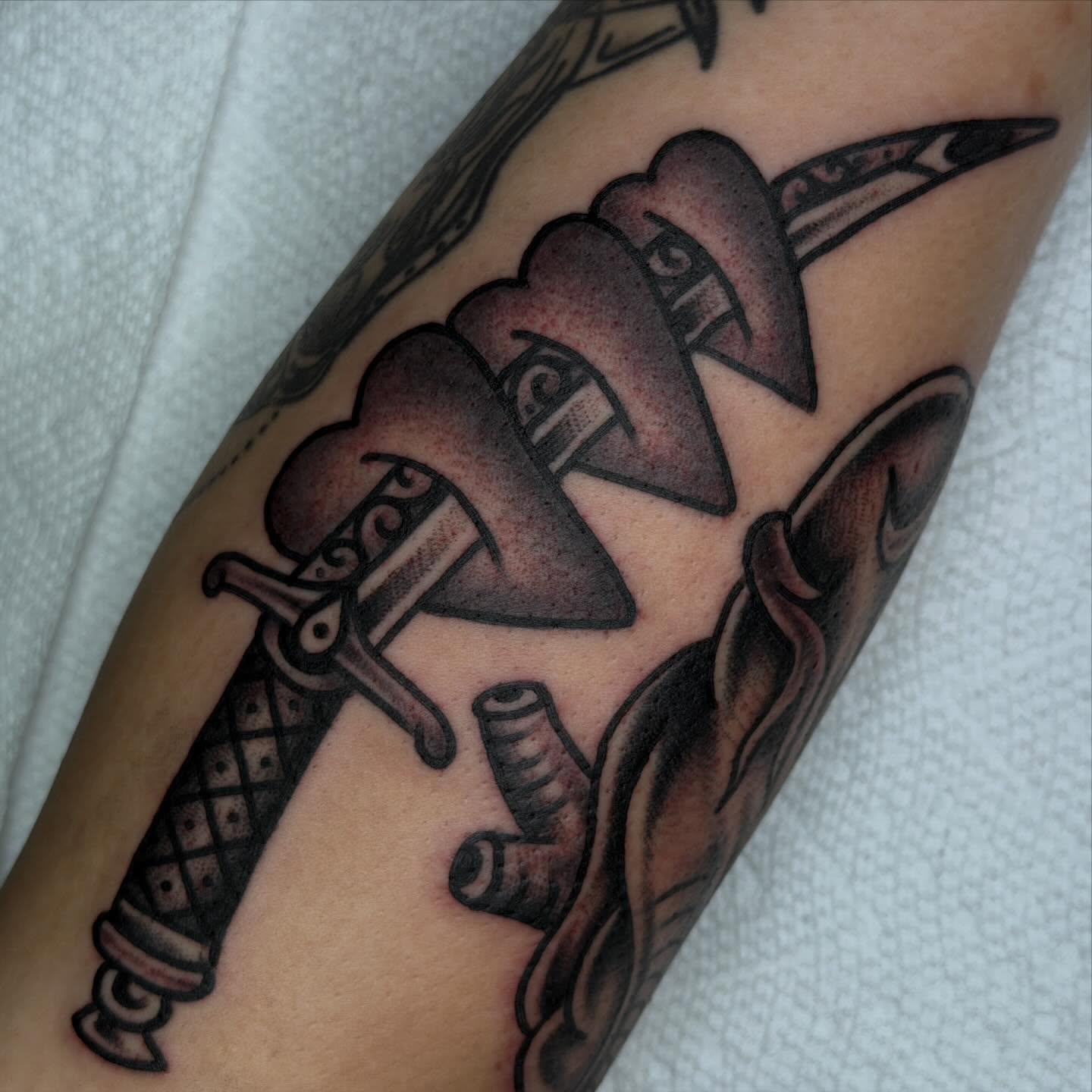 Ice cream cone American traditional tattoo on the forearm by Tony Kaplan