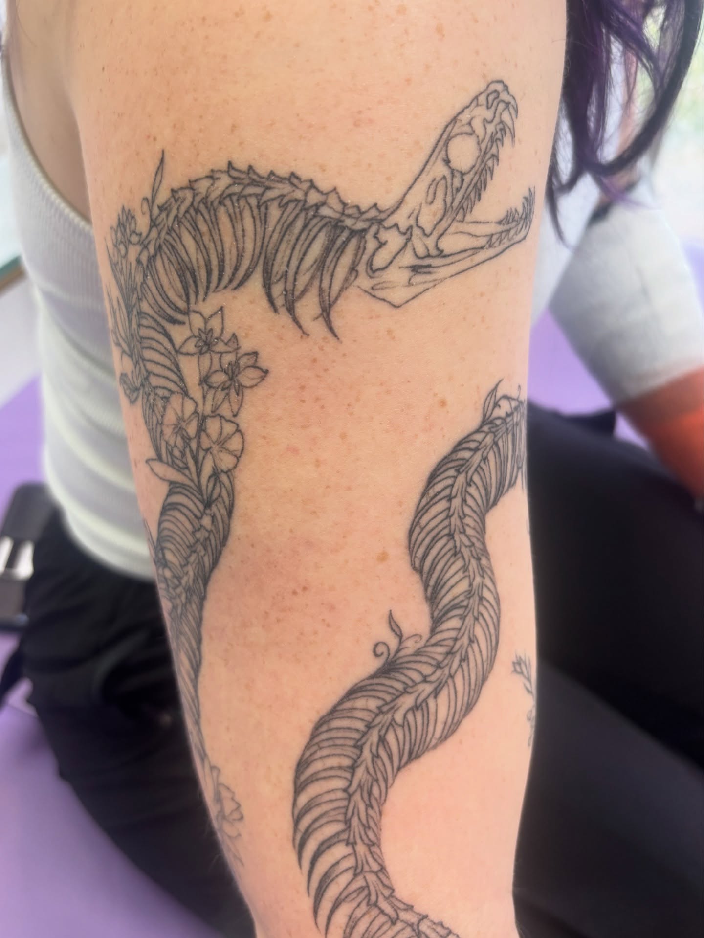 Snake black and grey tattoo on the forearm by Ivanna
