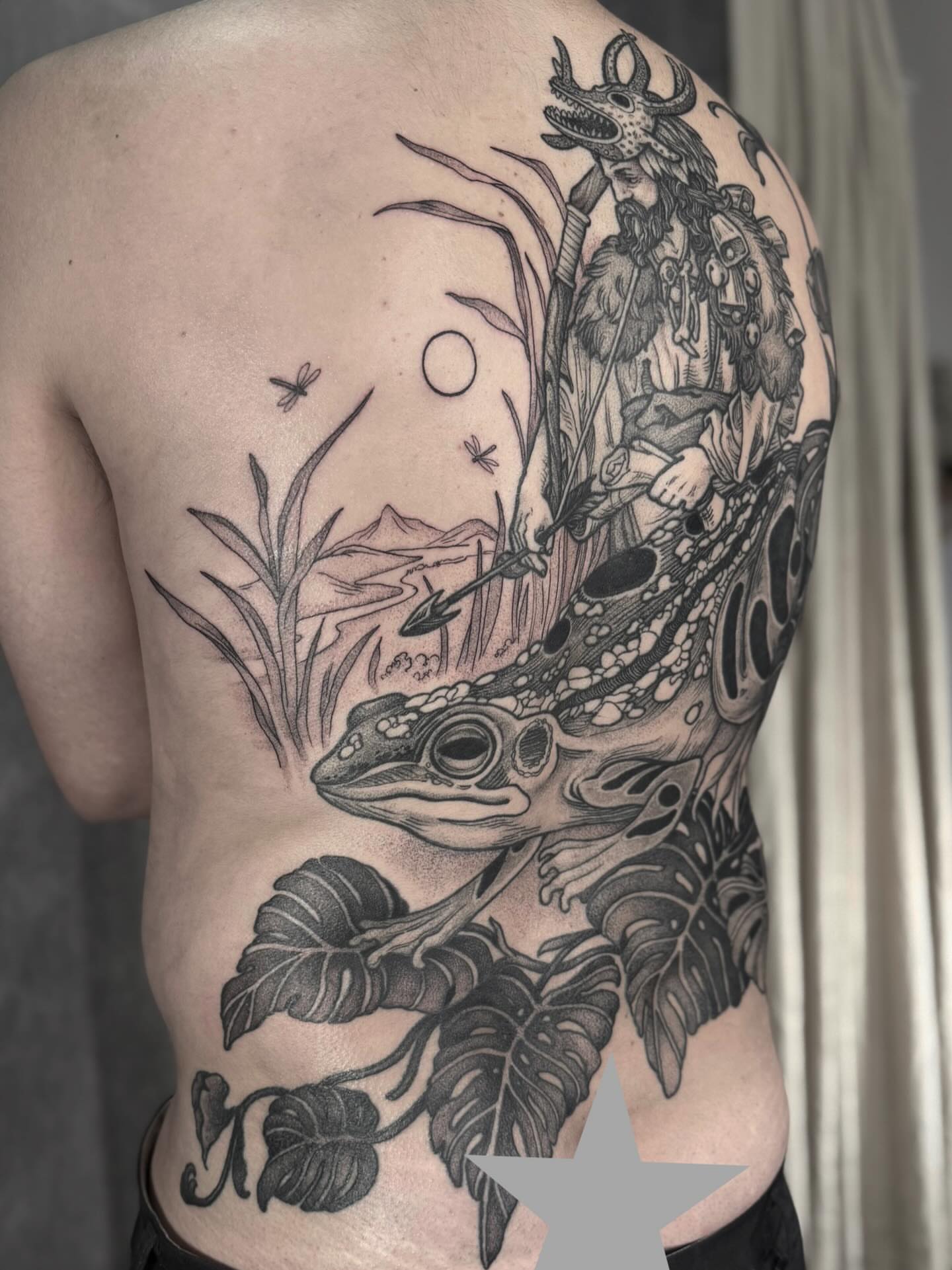 Frog and fisherman realism tattoo on the back by Hillary