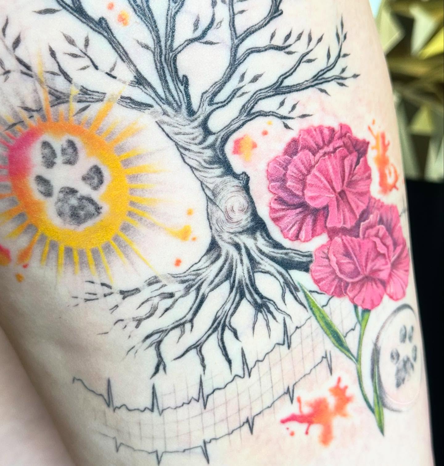 Tree with paw print and flowers dotwork tattoo on the forearm by Sarah Nash