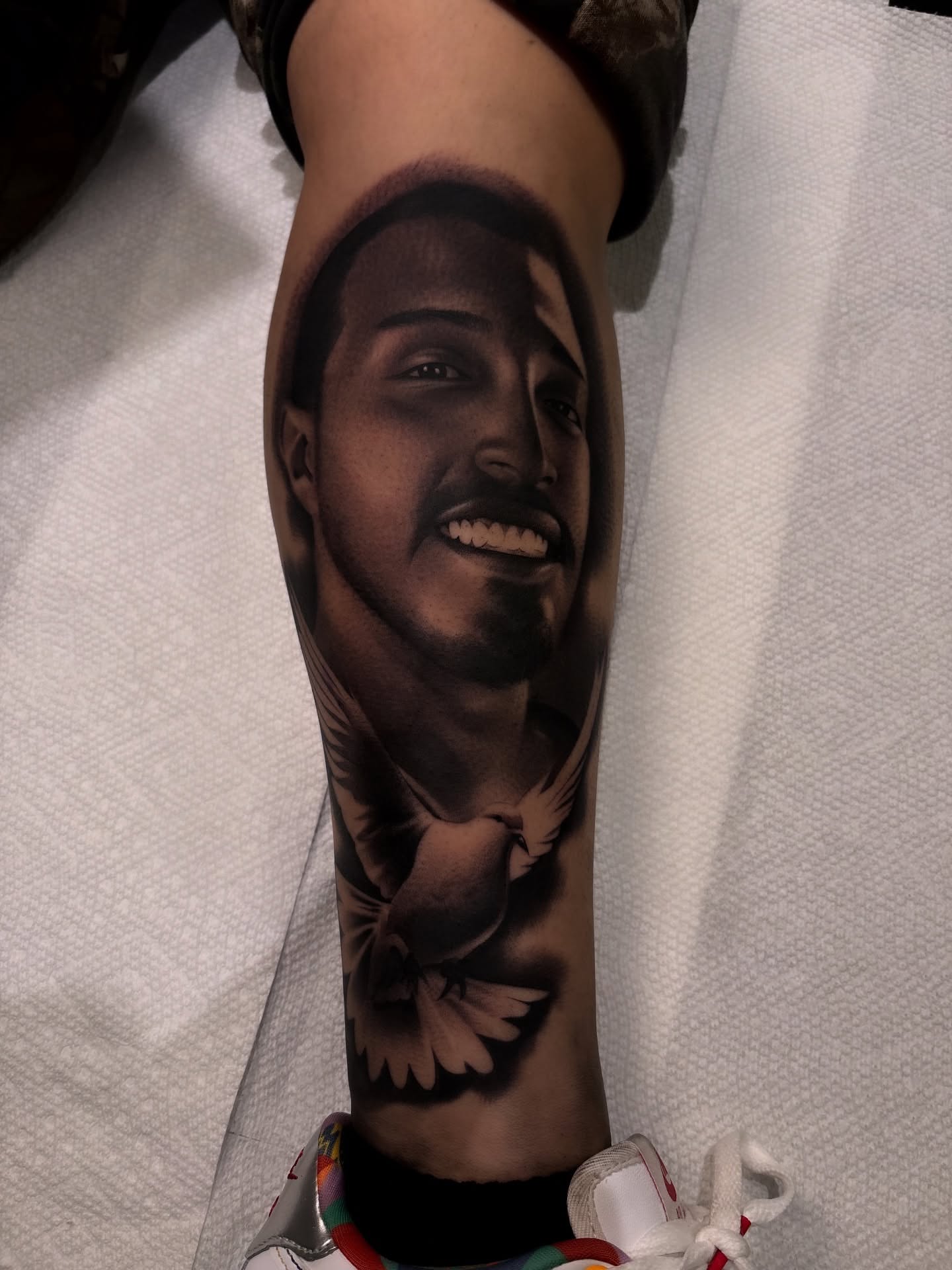 Portrait realism tattoo on the forearm by 𝖃𝖆𝖛𝖎𝖊𝖗 𝕬. 𝕾𝖆𝖑𝖎𝖓𝖆𝖘