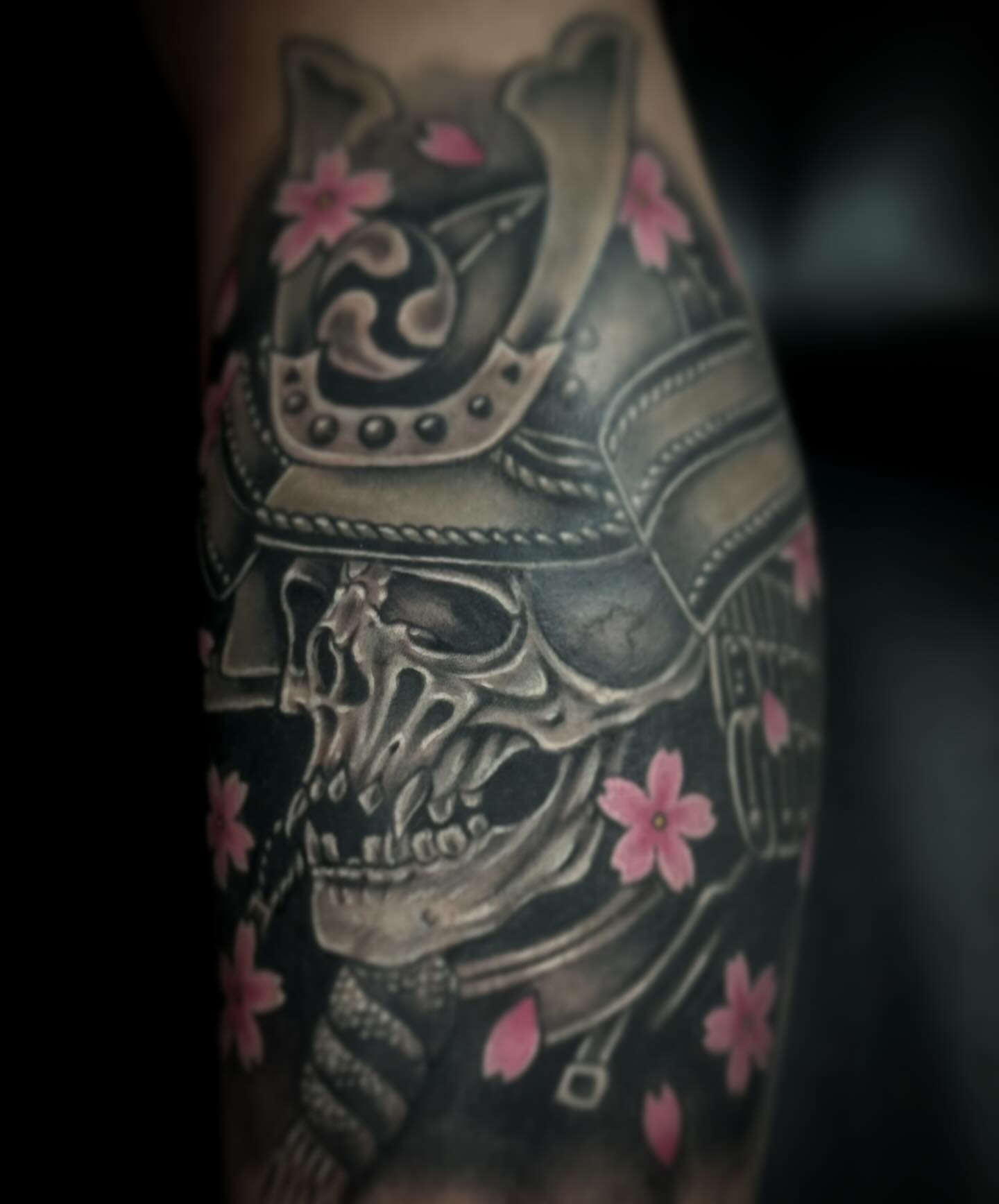 Samurai skull with cherry blossoms japanese irezumi tattoo on the forearm by Jameson William Cowan