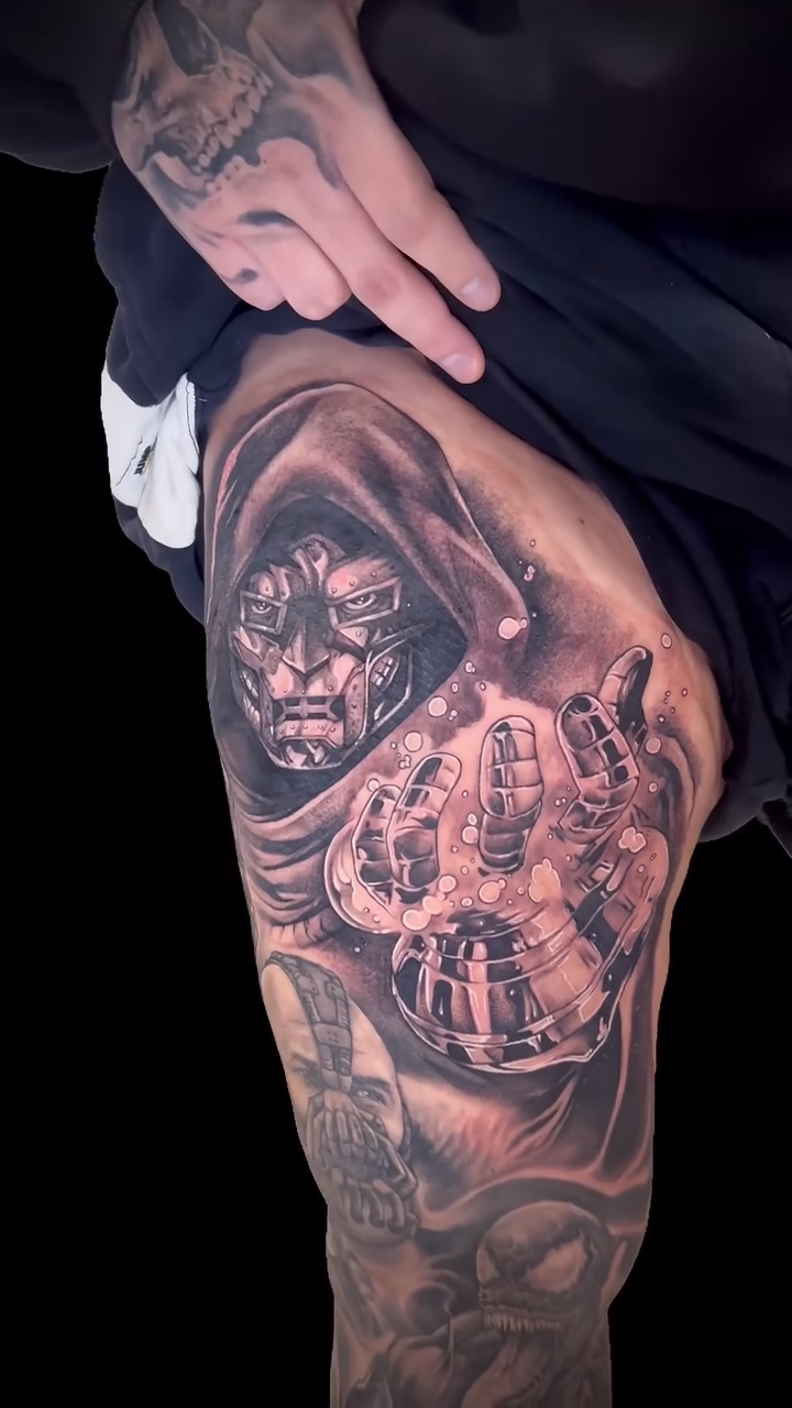Figure and hooded cloak realism tattoo by Daniel Fisher, Berlin, New Jersey