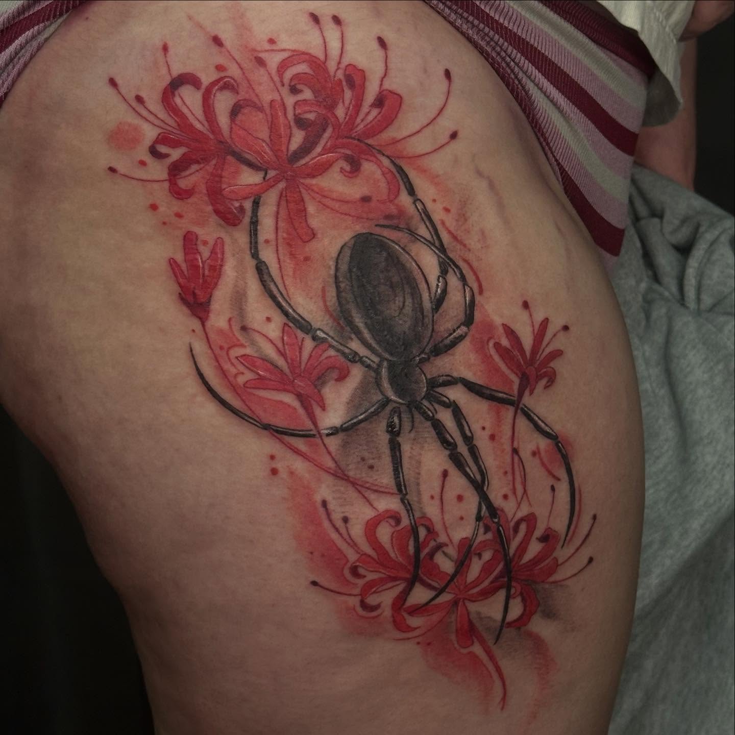 Beetle and flowers realism tattoo on the thigh by Halle Haas