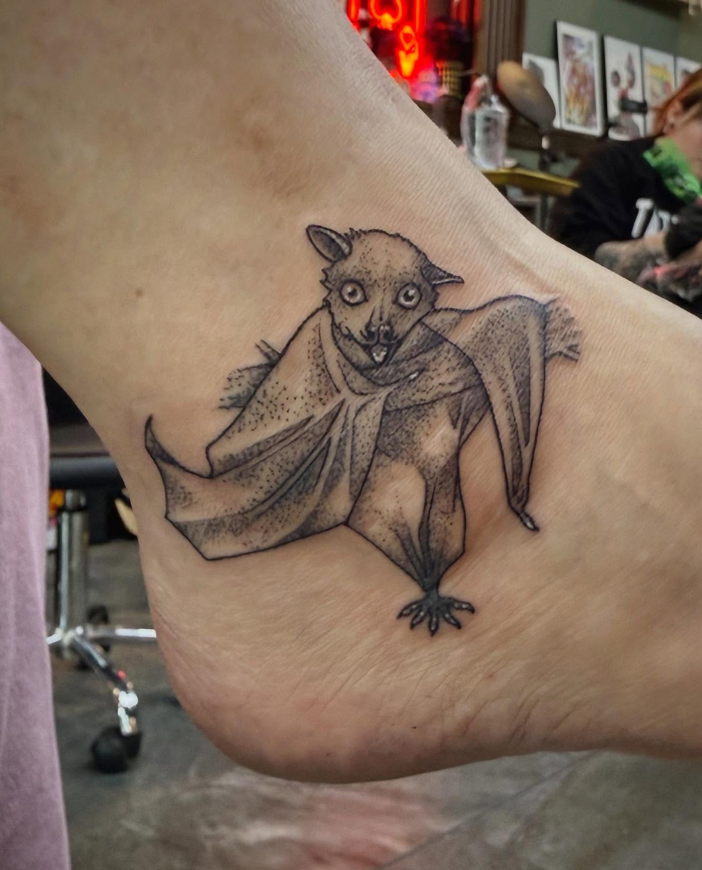Bat dotwork tattoo on the forearm by Ashley Kayser