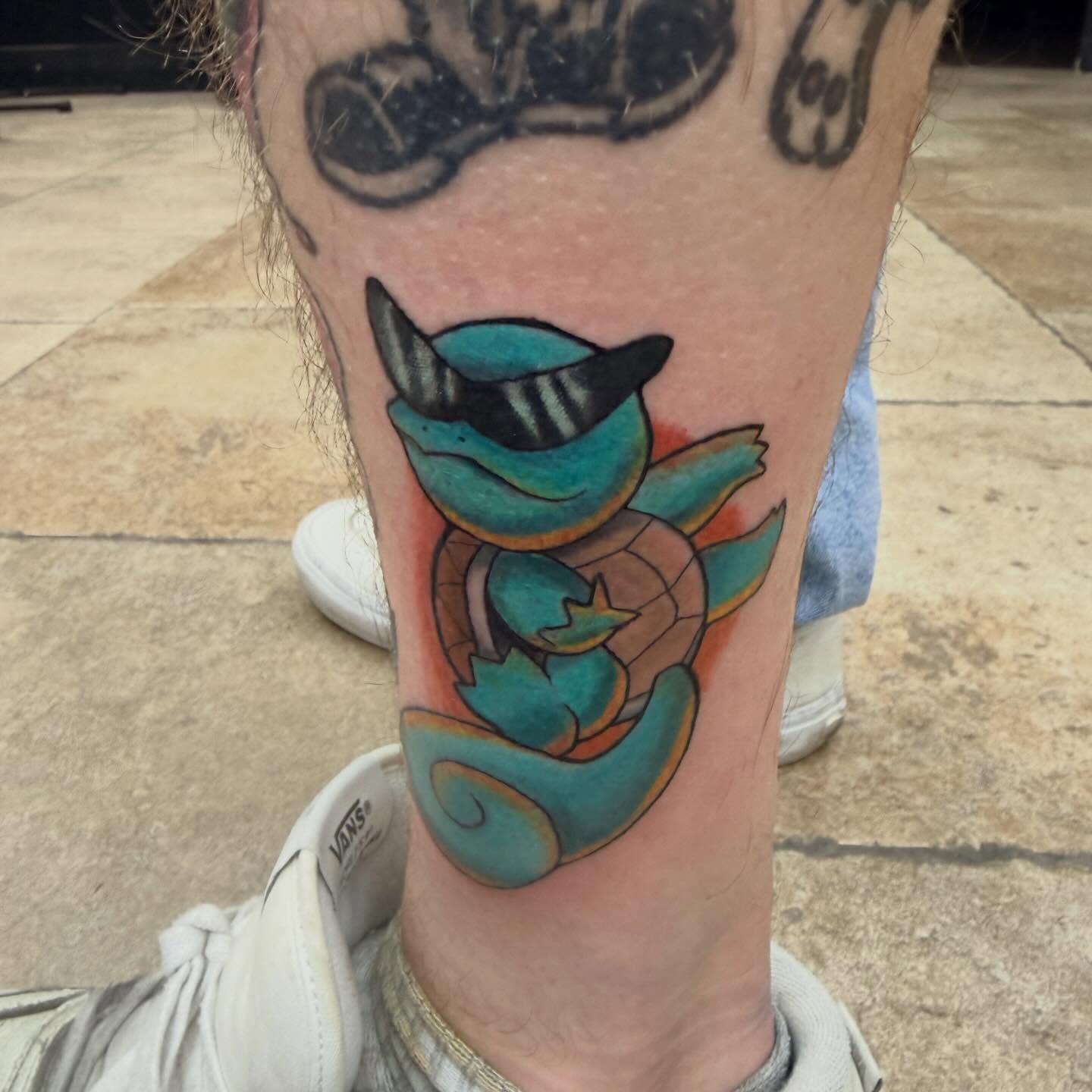 Squirtle new school tattoo on the forearm by Ellari