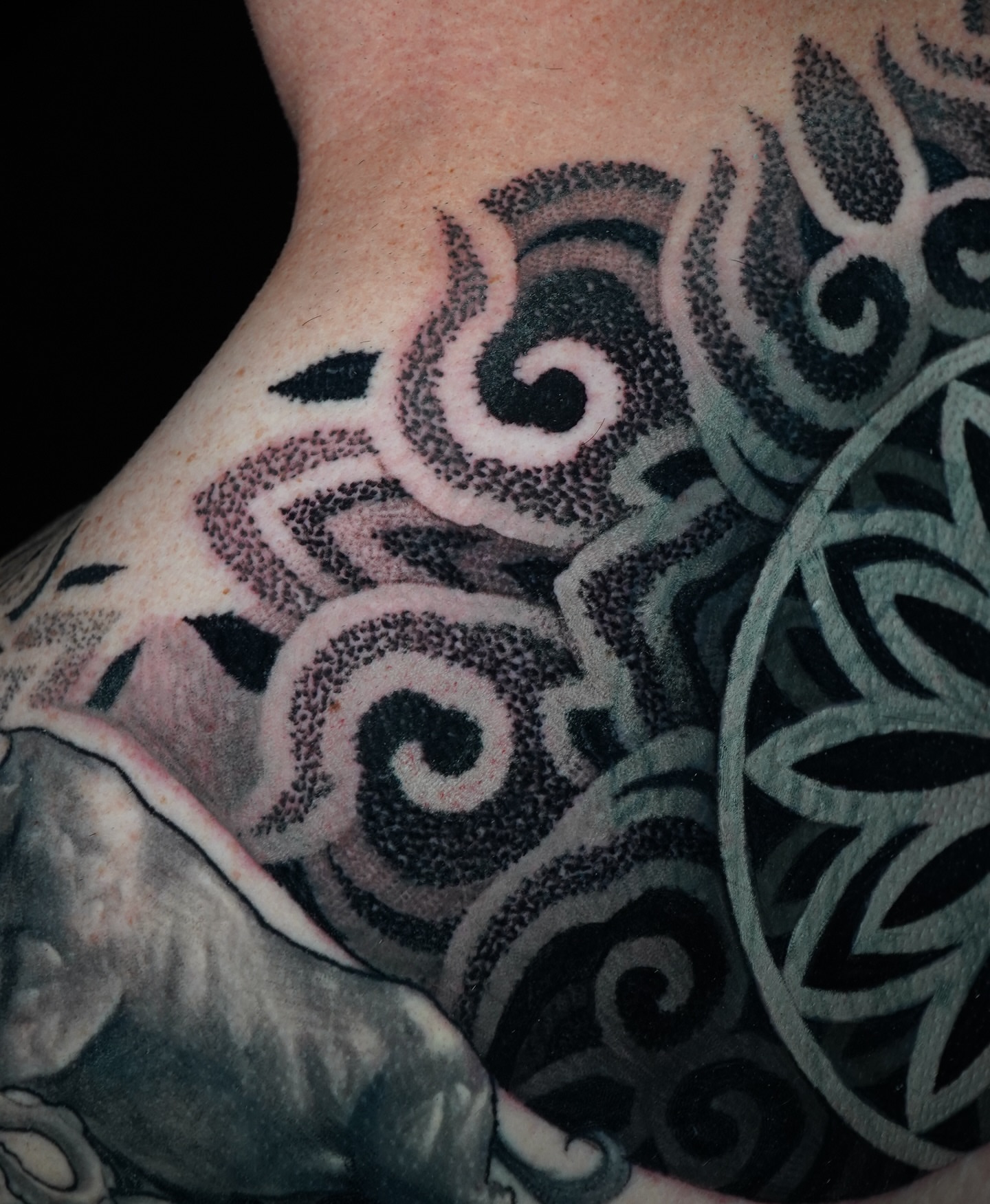 Swirls dotwork tattoo on the neck by Luis Gil