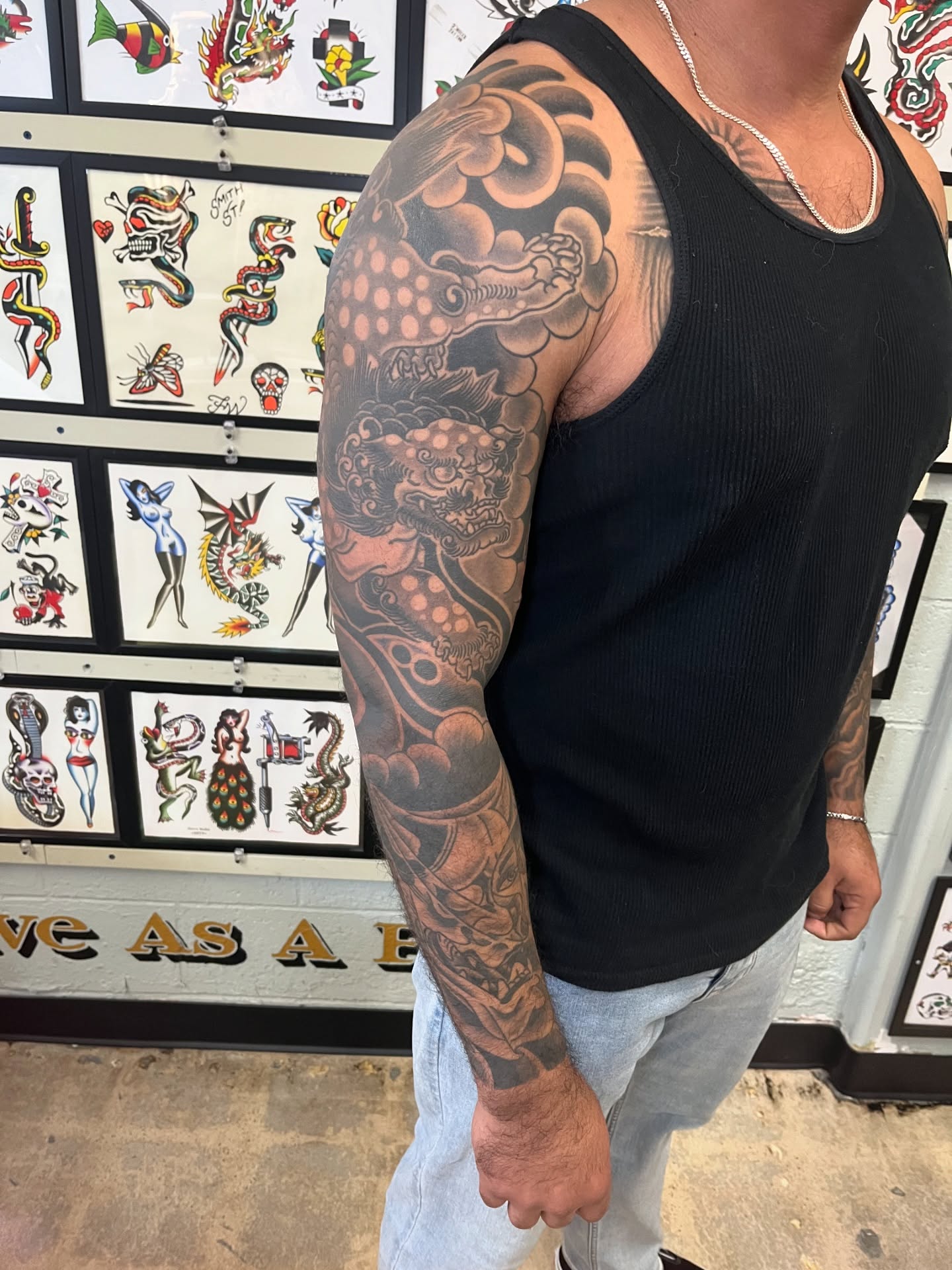 Dragon and clouds japanese irezumi tattoo on the upper arm by Tim Howell