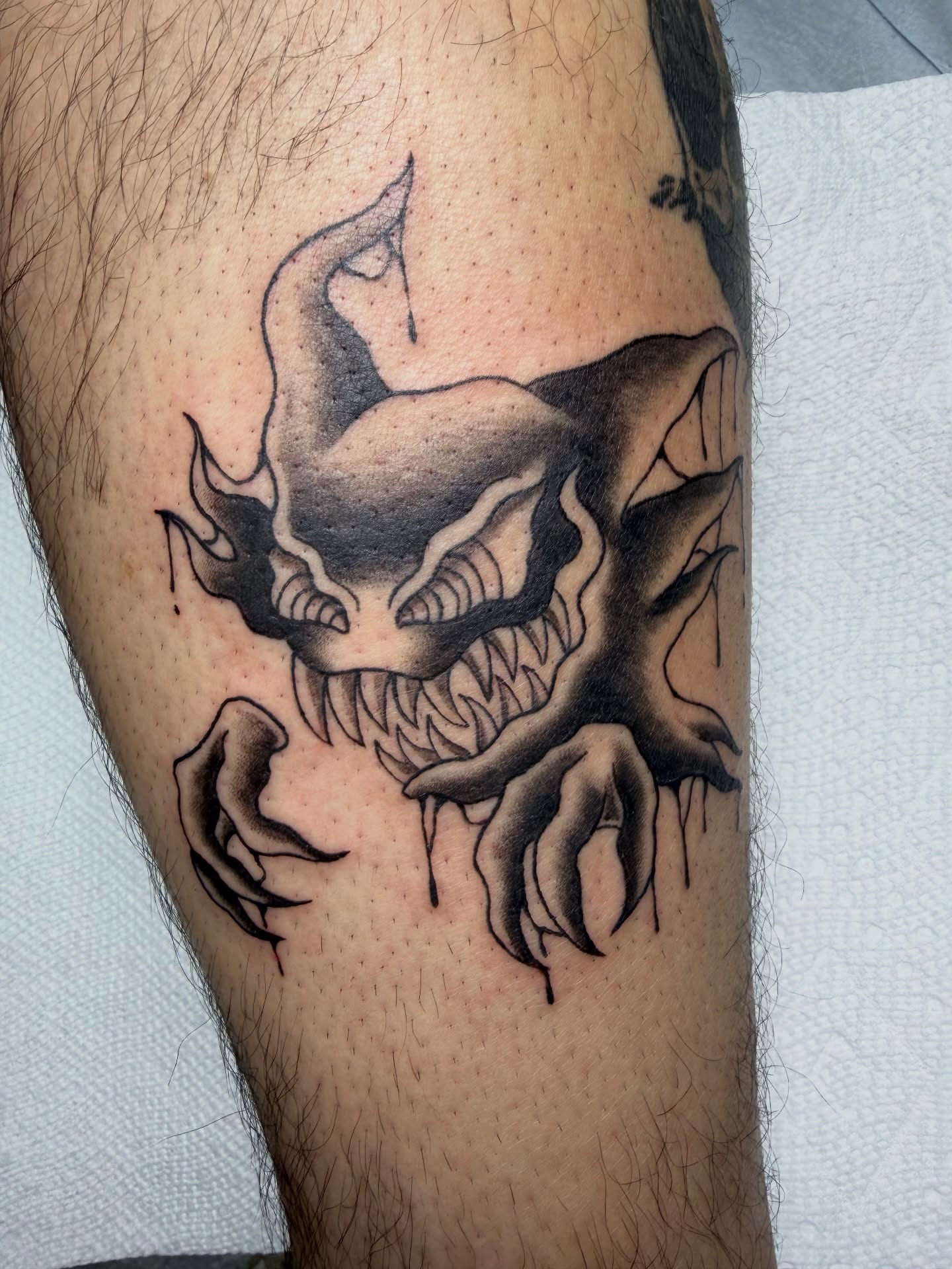 Demon black and grey tattoo on the forearm by Kayla Jackson, Phoenix, Arizona
