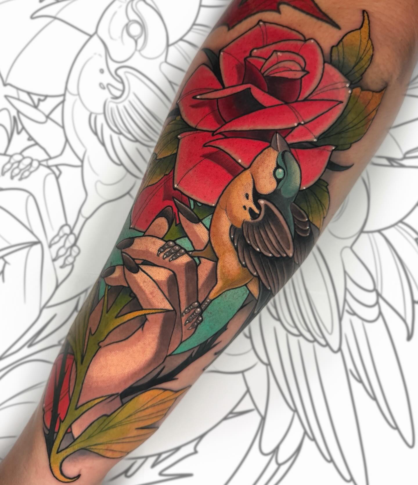 Bird and rose American traditional tattoo on the forearm by James Boag
