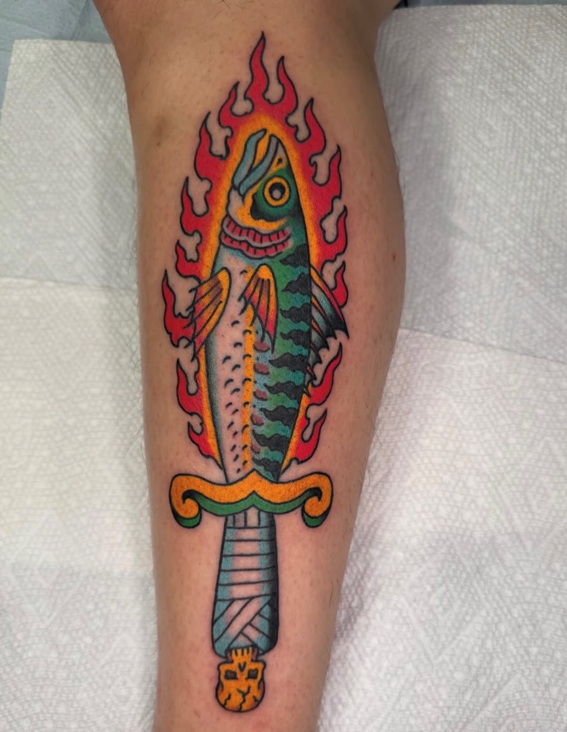 Fish knife American traditional tattoo on the forearm by Zak Colburn