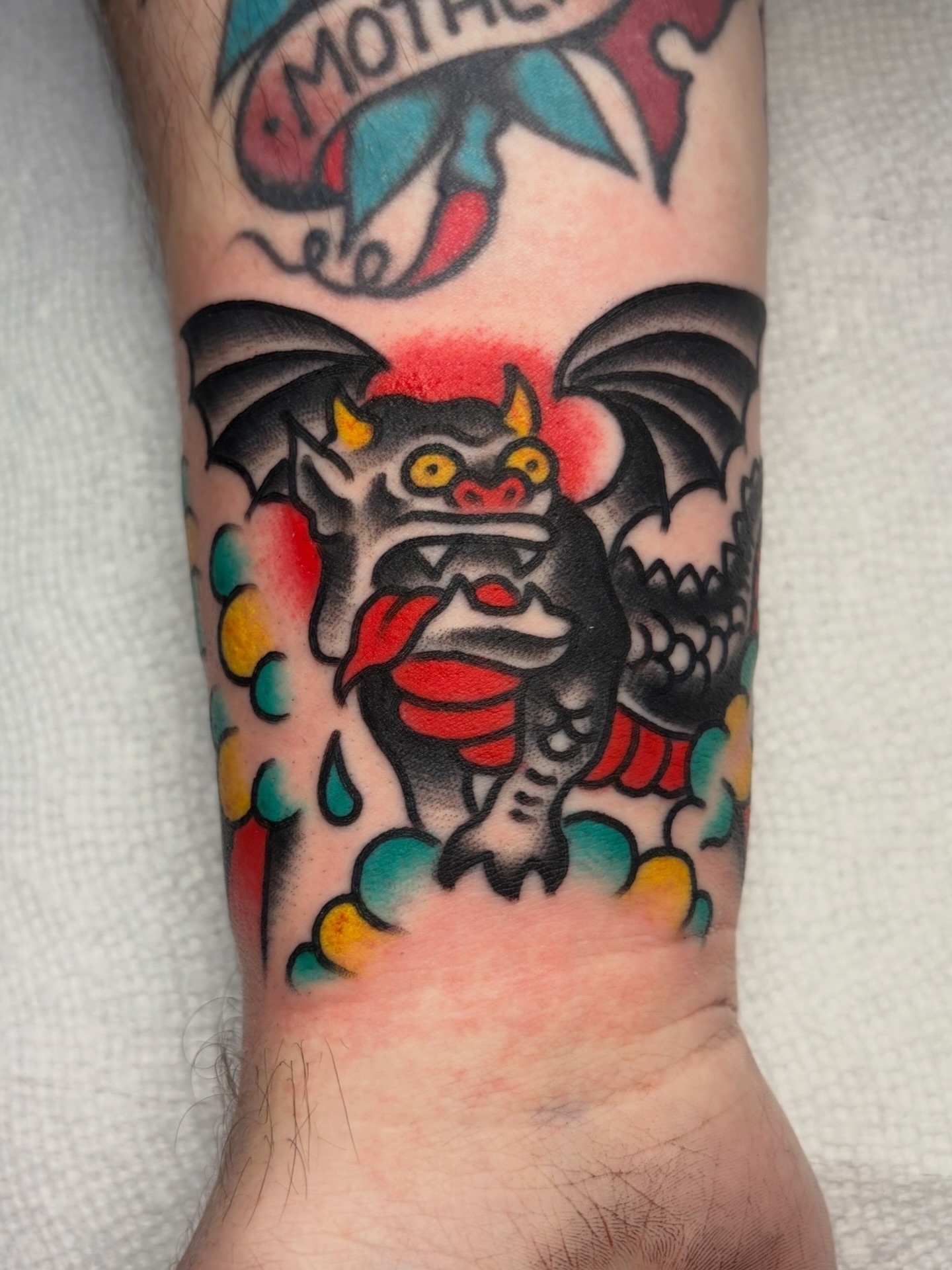 Demon American traditional tattoo on the forearm by David Armacost, Cincinnati, Ohio
