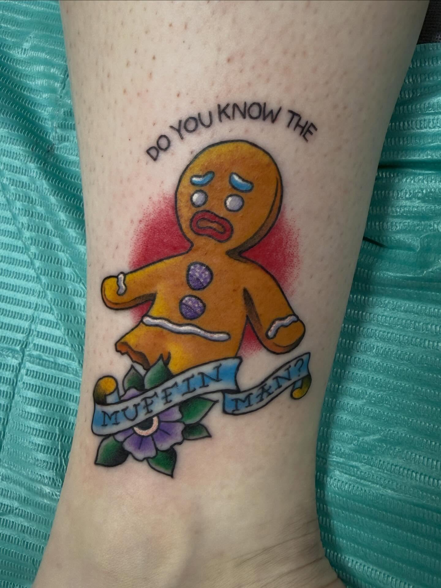 Gingerbread man American traditional tattoo on the forearm by McKenna Chalifoux